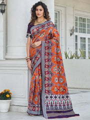 Sumptuous Purple And Orange Patola Weaving Silk Reception Wear Saree