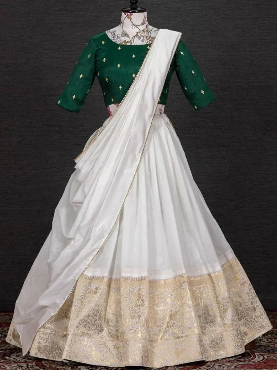 White and green designer lehenga choli with gold embroidery, perfect for Indian ethnic wear occasions