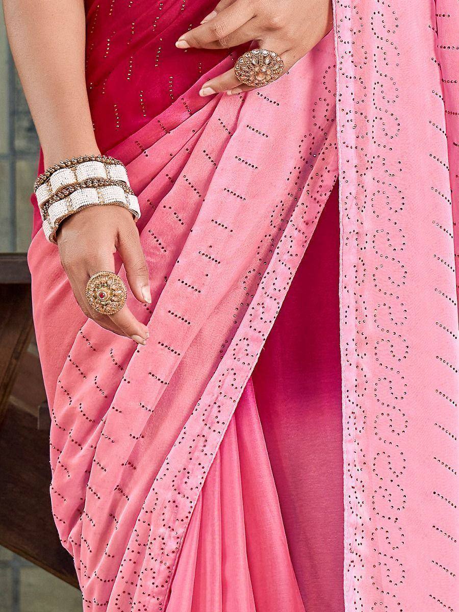 Pink embroidered saree with gold jewelry, ethnic Indian wear