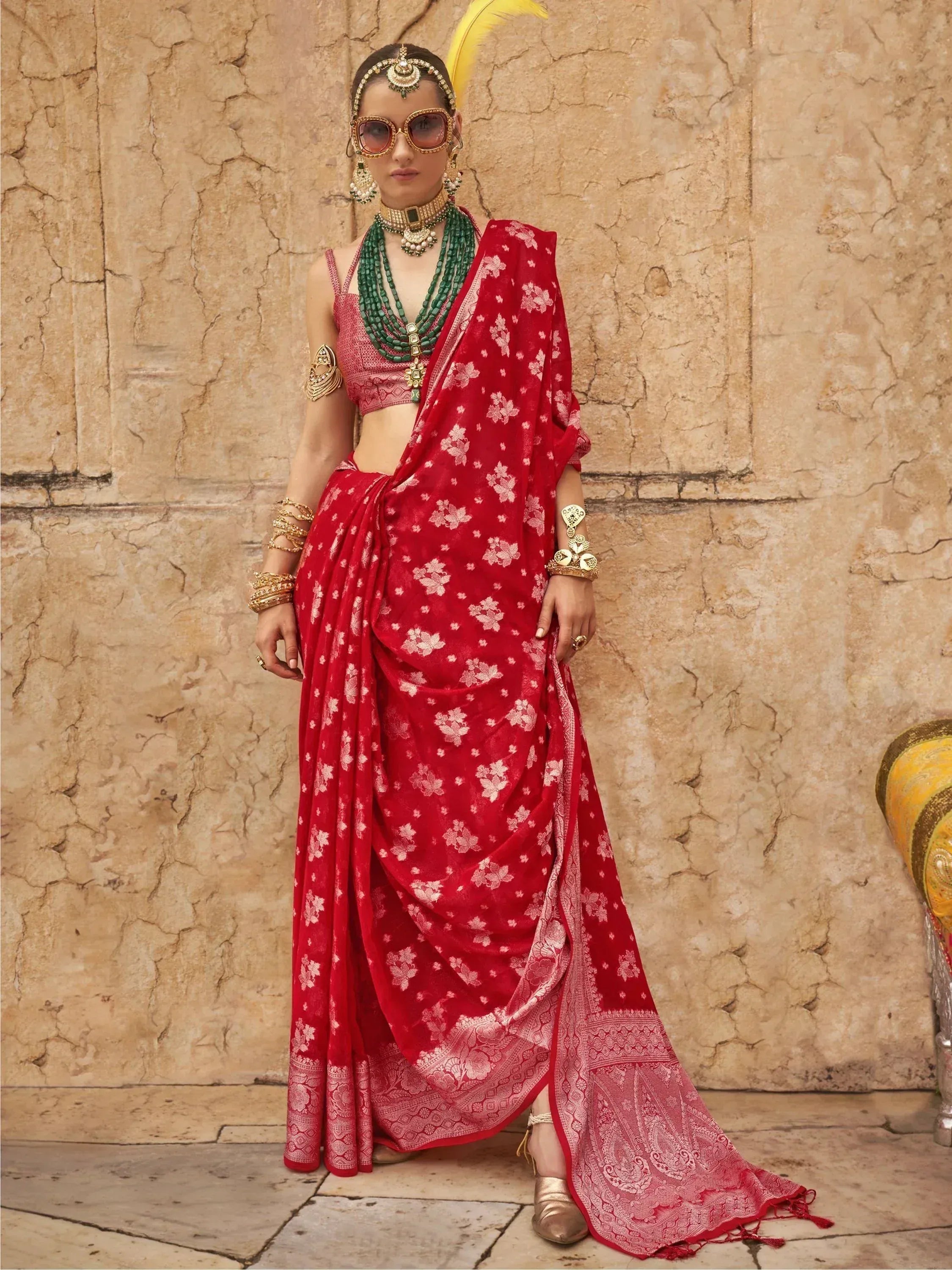 Red floral printed saree with gold jewelry, ethnic Indian wear for weddings and festivals