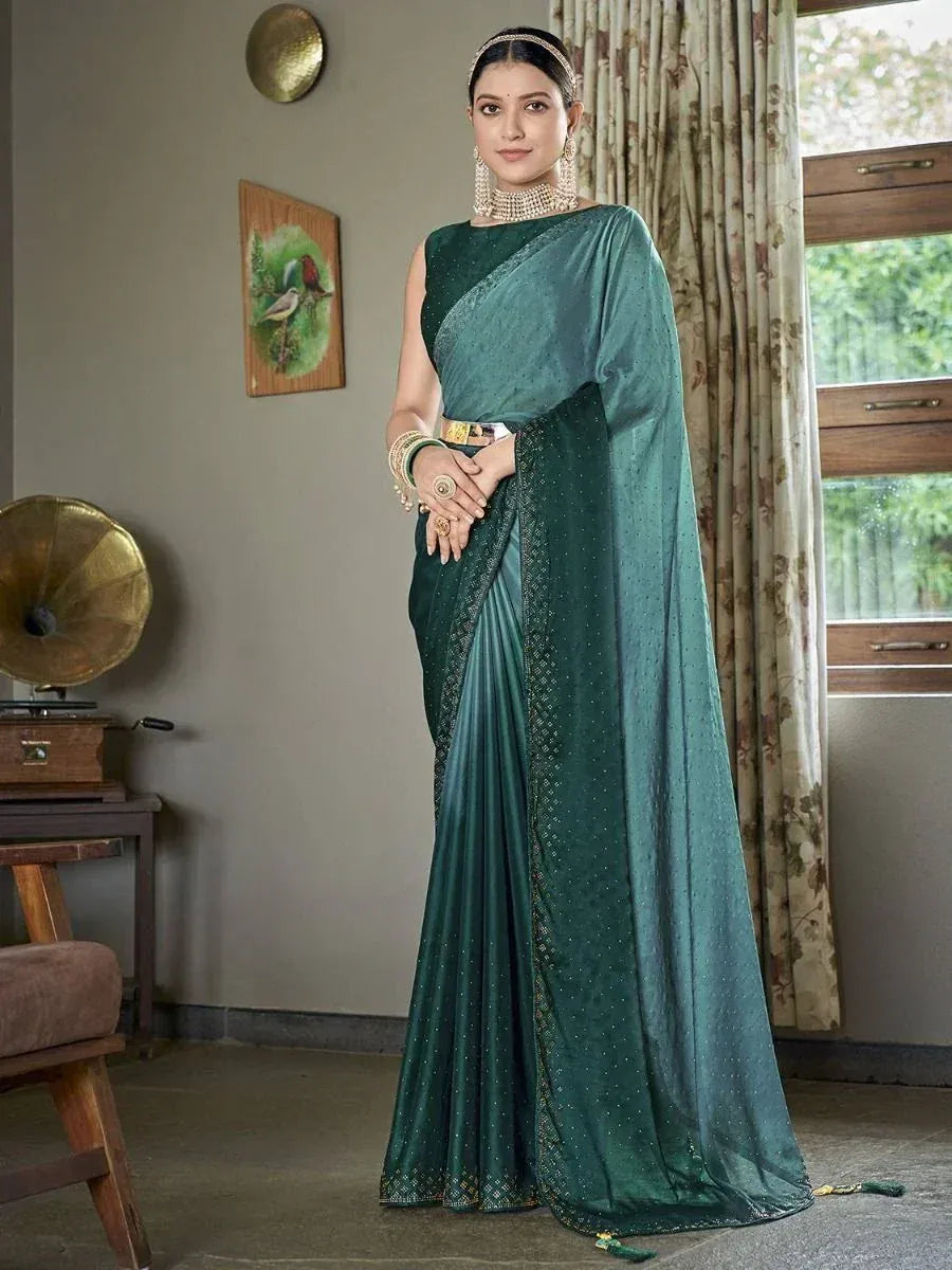 Emerald green designer saree with sequin detailing, perfect for Indian ethnic occasions