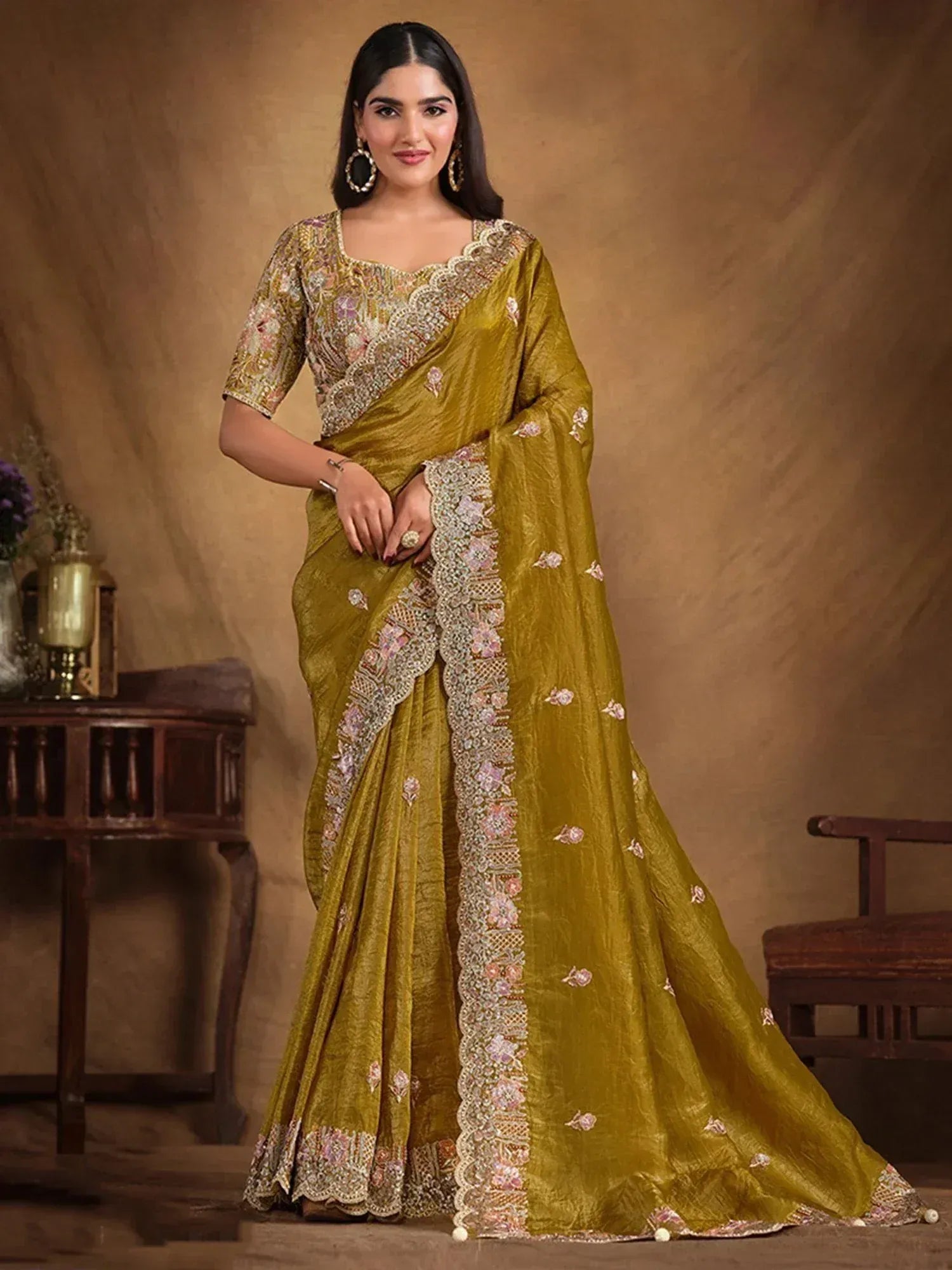 Mustard yellow embroidered saree with floral border and designer blouse for Indian ethnic wear