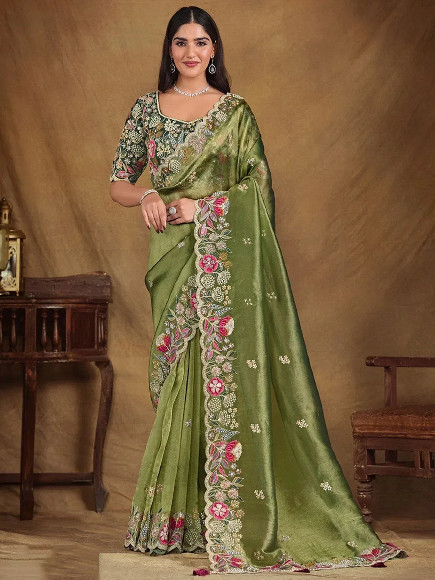 Green embroidered saree with floral border, designer Indian ethnic wear for women