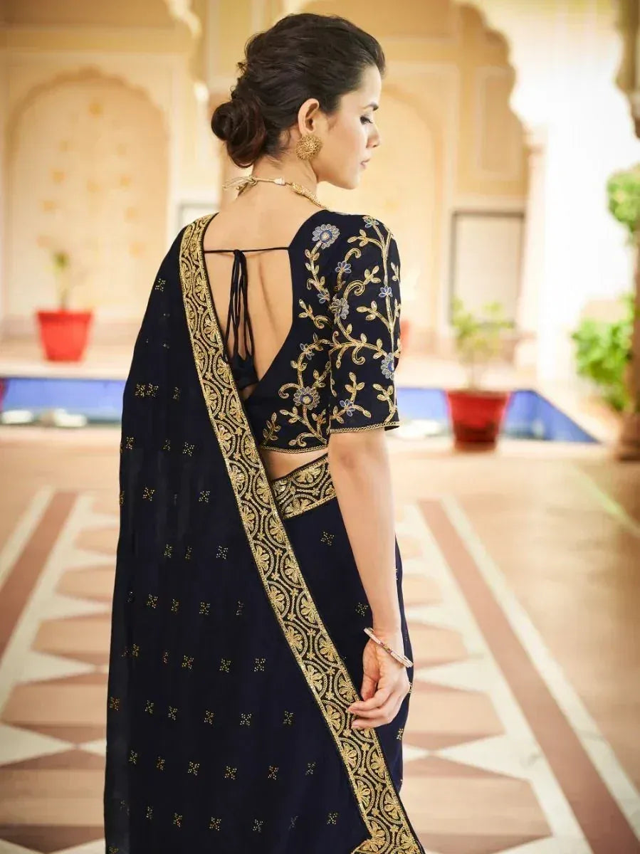Navy blue embroidered saree with gold border and backless blouse, Indian ethnic wear