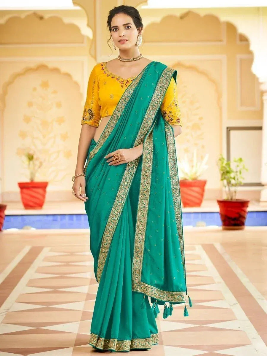 Teal saree with gold border and yellow blouse, ethnic Indian wear for women