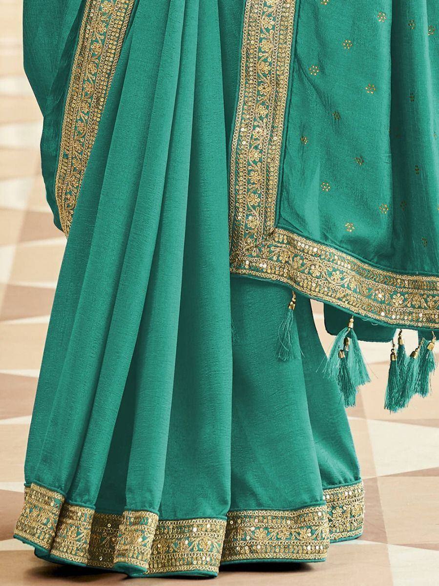 Teal saree with gold embroidery and tassels, Indian ethnic wear