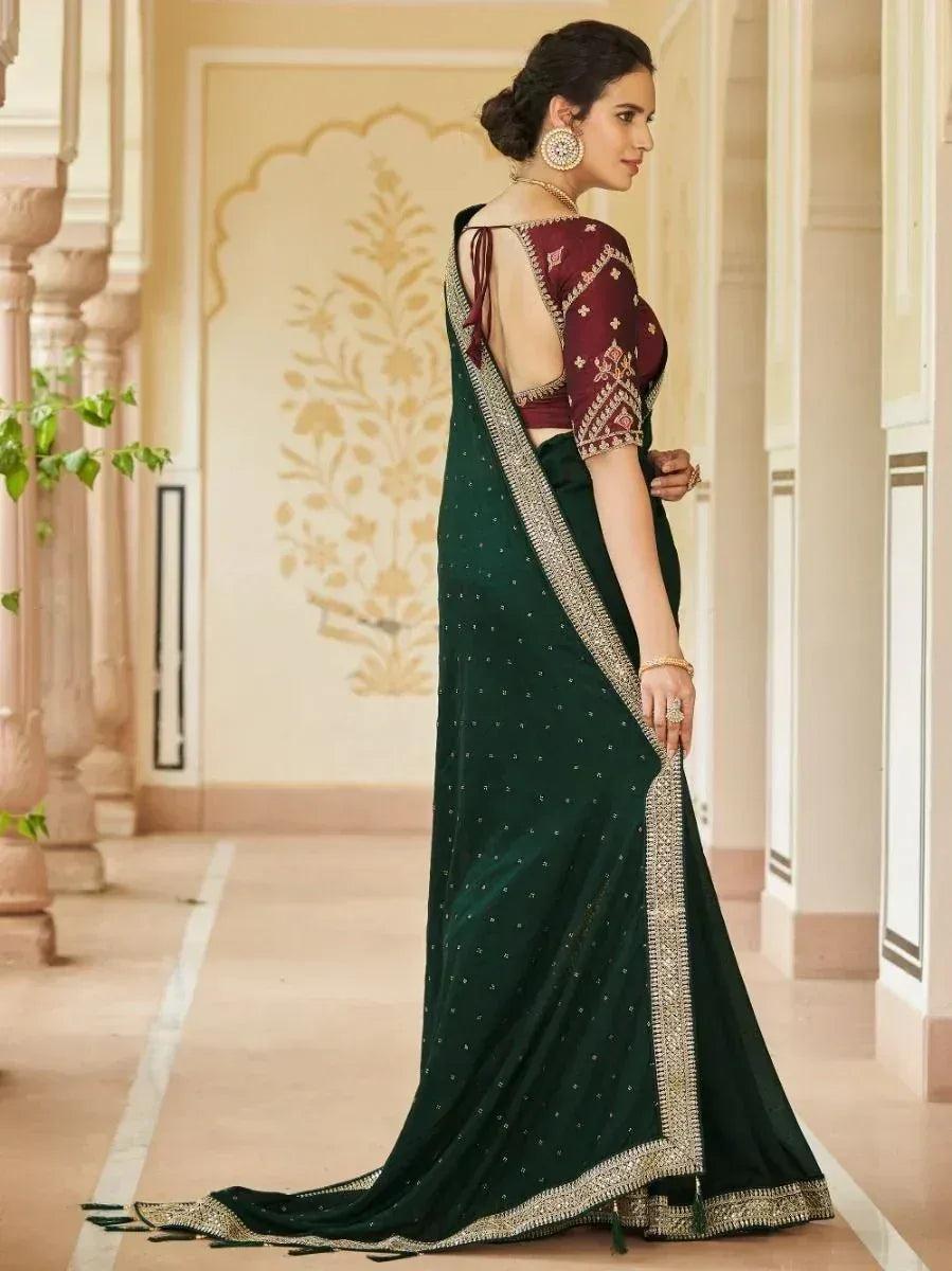 Emerald green saree with gold border and maroon embroidered blouse, ethnic Indian wear
