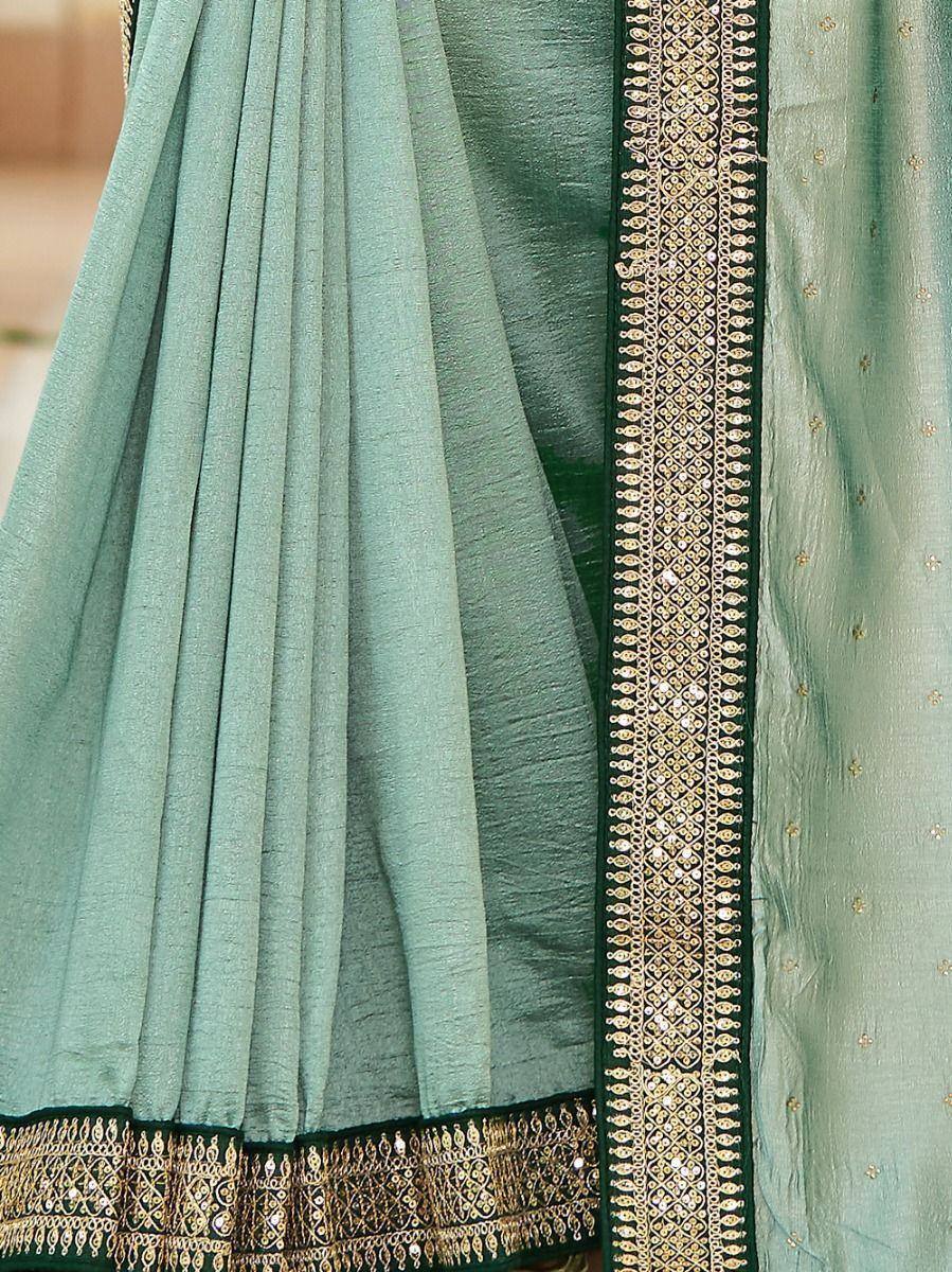 Mint green saree with gold and black embroidered border, ethnic wear for women