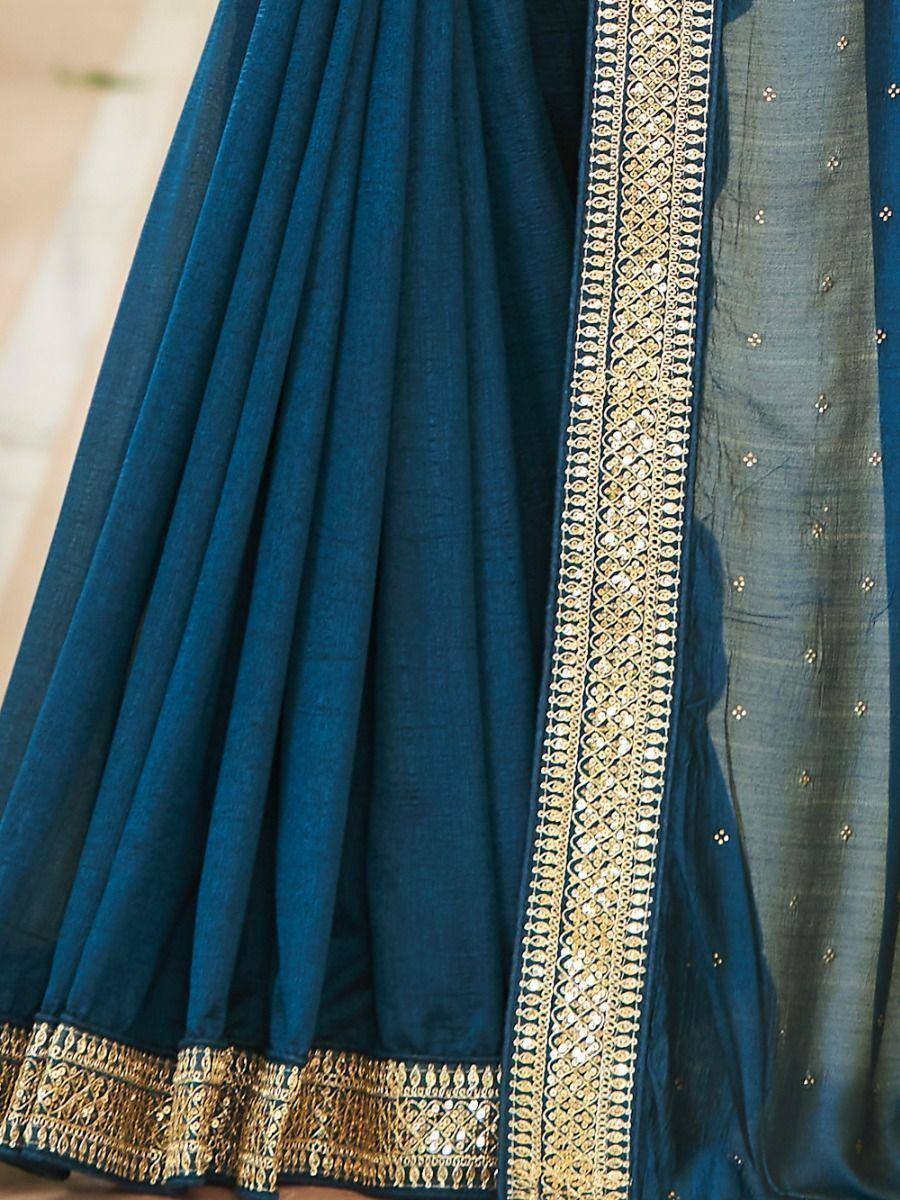 Teal blue lehenga with gold embroidery and sheer dupatta, Indian ethnic wear