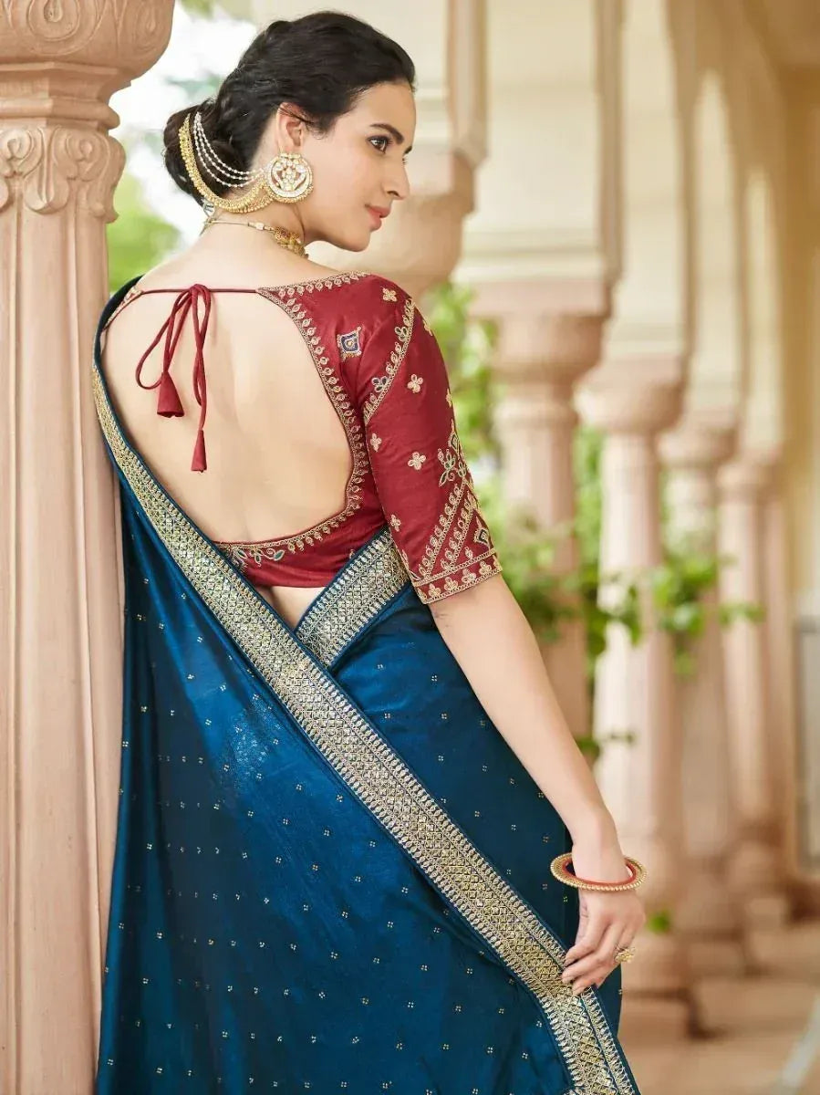 Blue saree with gold border and maroon embroidered blouse, backless design, ethnic wear