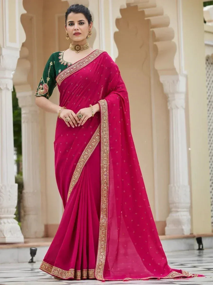 Pink embroidered saree with green blouse, gold border, traditional Indian ethnic wear for women