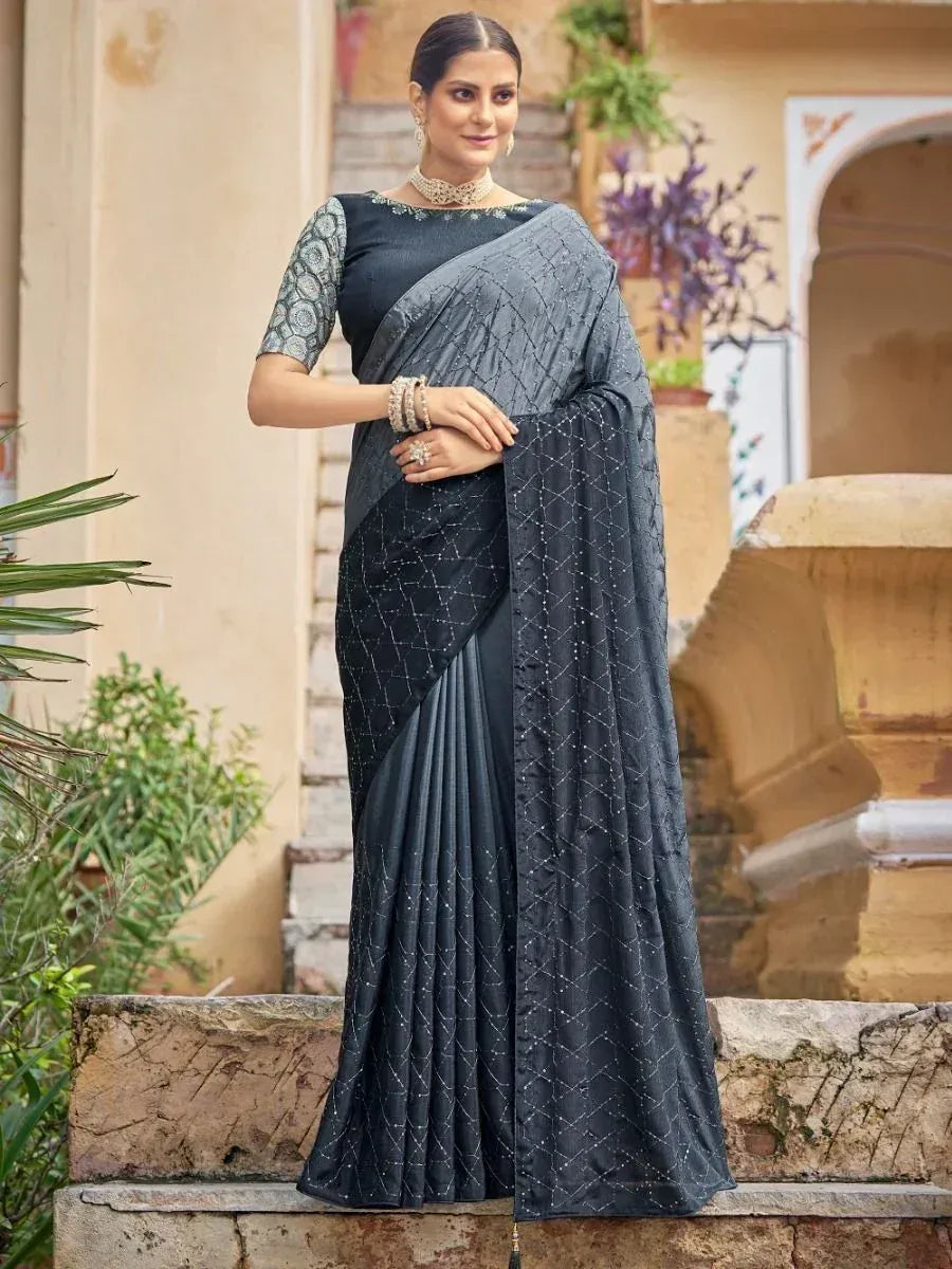 Elegant black designer saree with geometric embroidery, perfect for Indian ethnic occasions