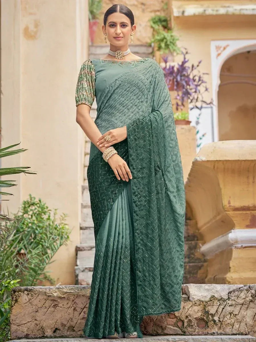 Elegant green embroidered saree with matching blouse, perfect for Indian ethnic occasions