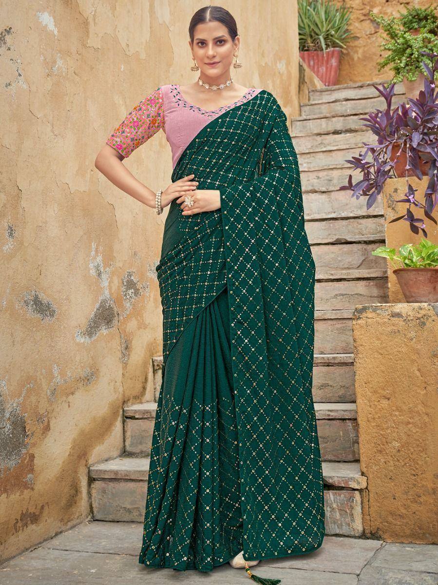 Emerald green saree with gold diamond print, paired with pink floral blouse, perfect for ethnic occasions
