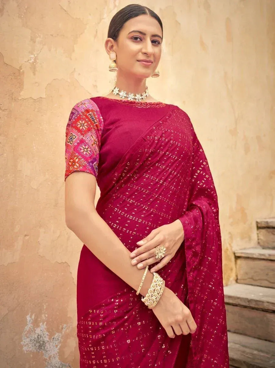 Elegant maroon saree with embroidered blouse, perfect for Indian ethnic occasions and festive wear.