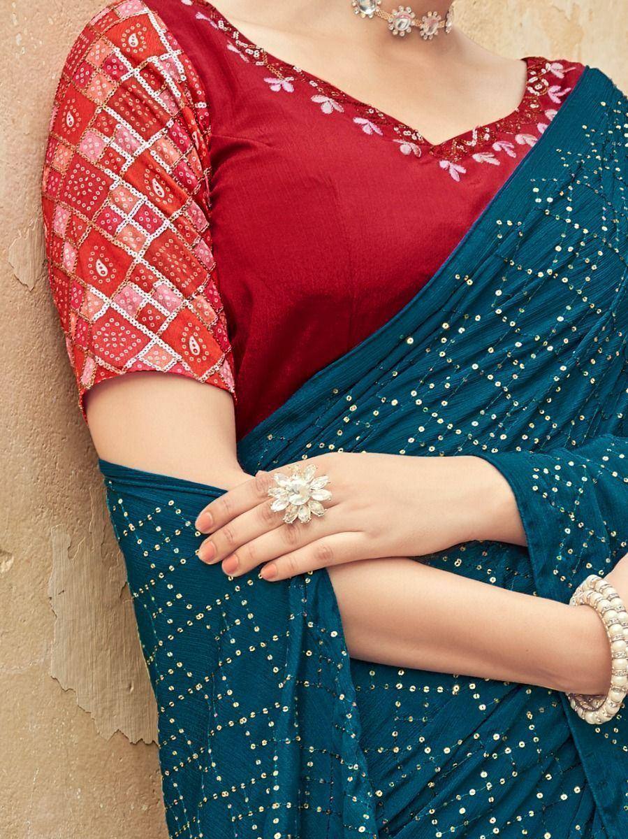 Teal saree with gold sequins paired with red embroidered blouse, Indian ethnic wear