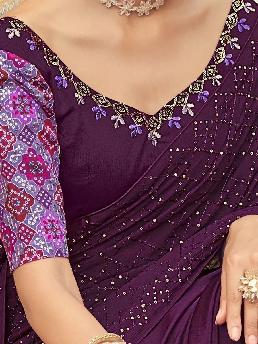 Purple embroidered saree with floral blouse, perfect for Indian ethnic wear occasions.