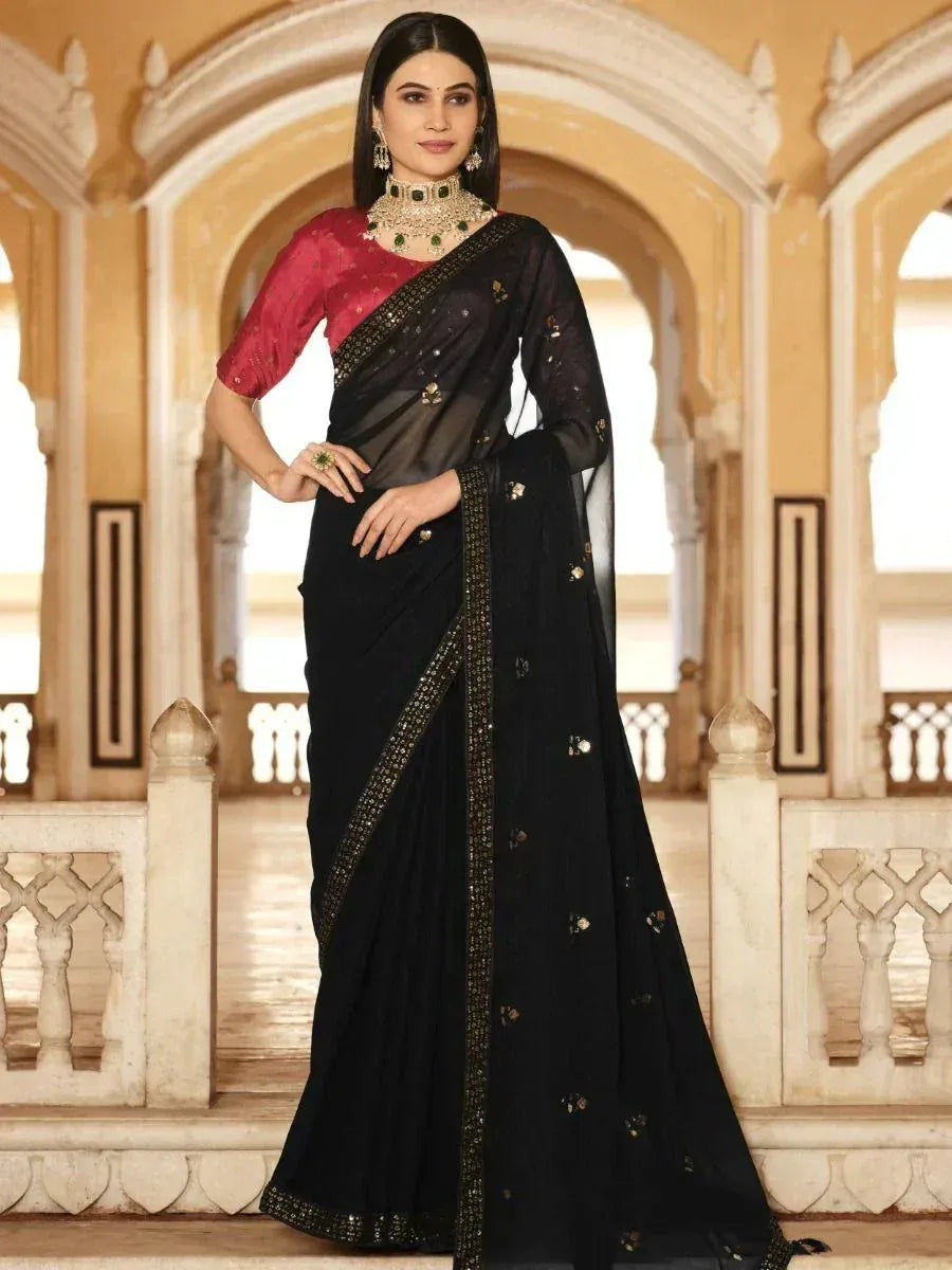Elegant black saree with gold embroidery, paired with red blouse, perfect for Indian ethnic occasions