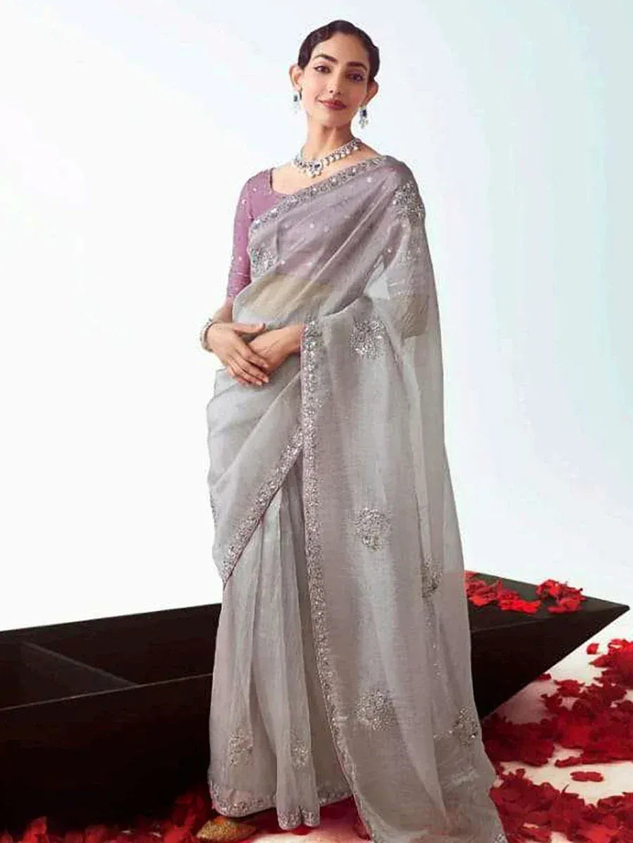 Elegant grey embroidered saree with purple blouse, perfect for Indian ethnic occasions and weddings
