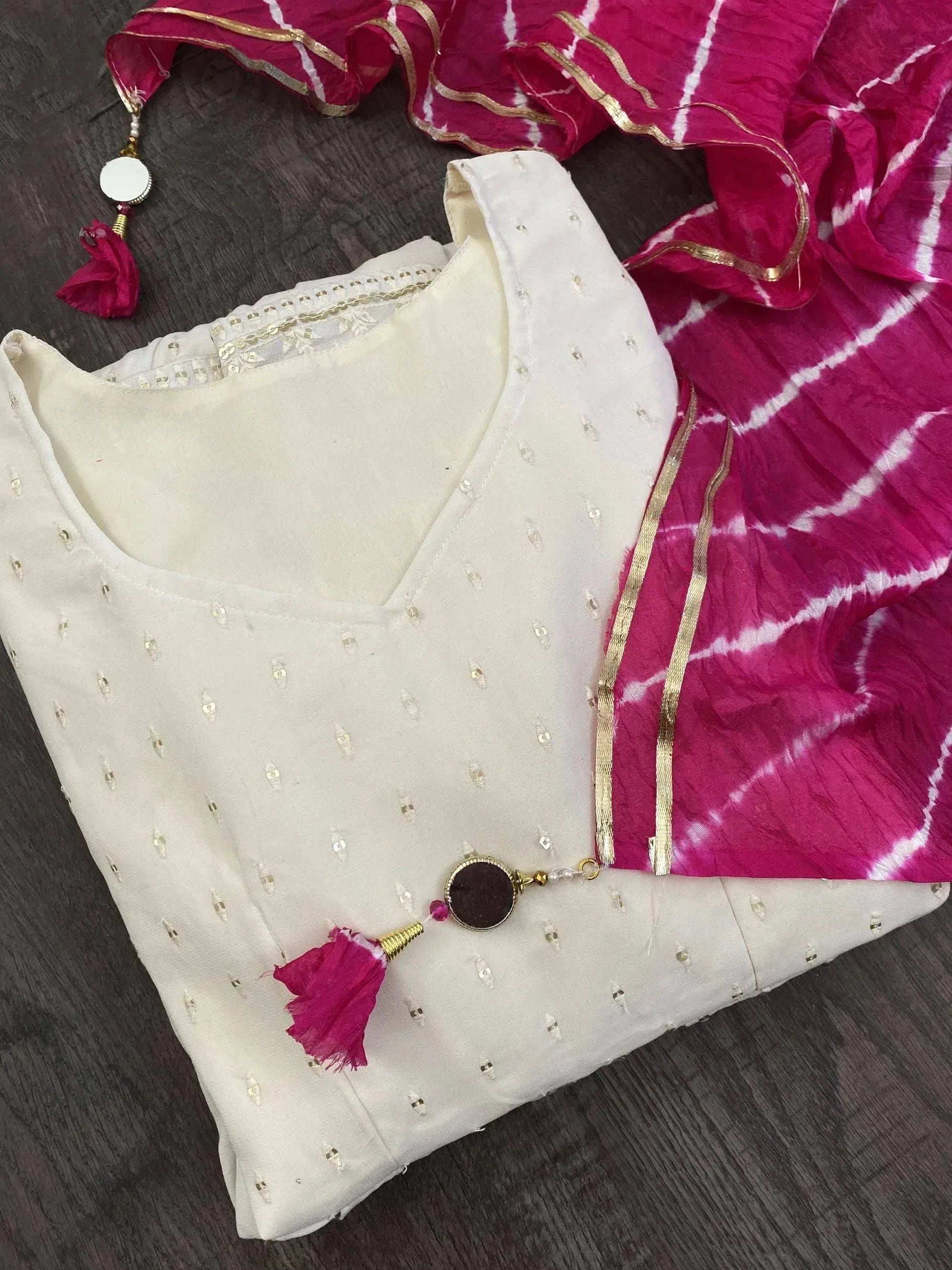 White embroidered kurta with pink tie-dye dupatta, perfect for Indian ethnic wear