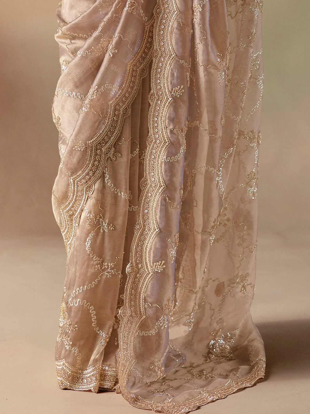 Beige embroidered saree with gold sequin and beadwork, elegant Indian ethnic wear