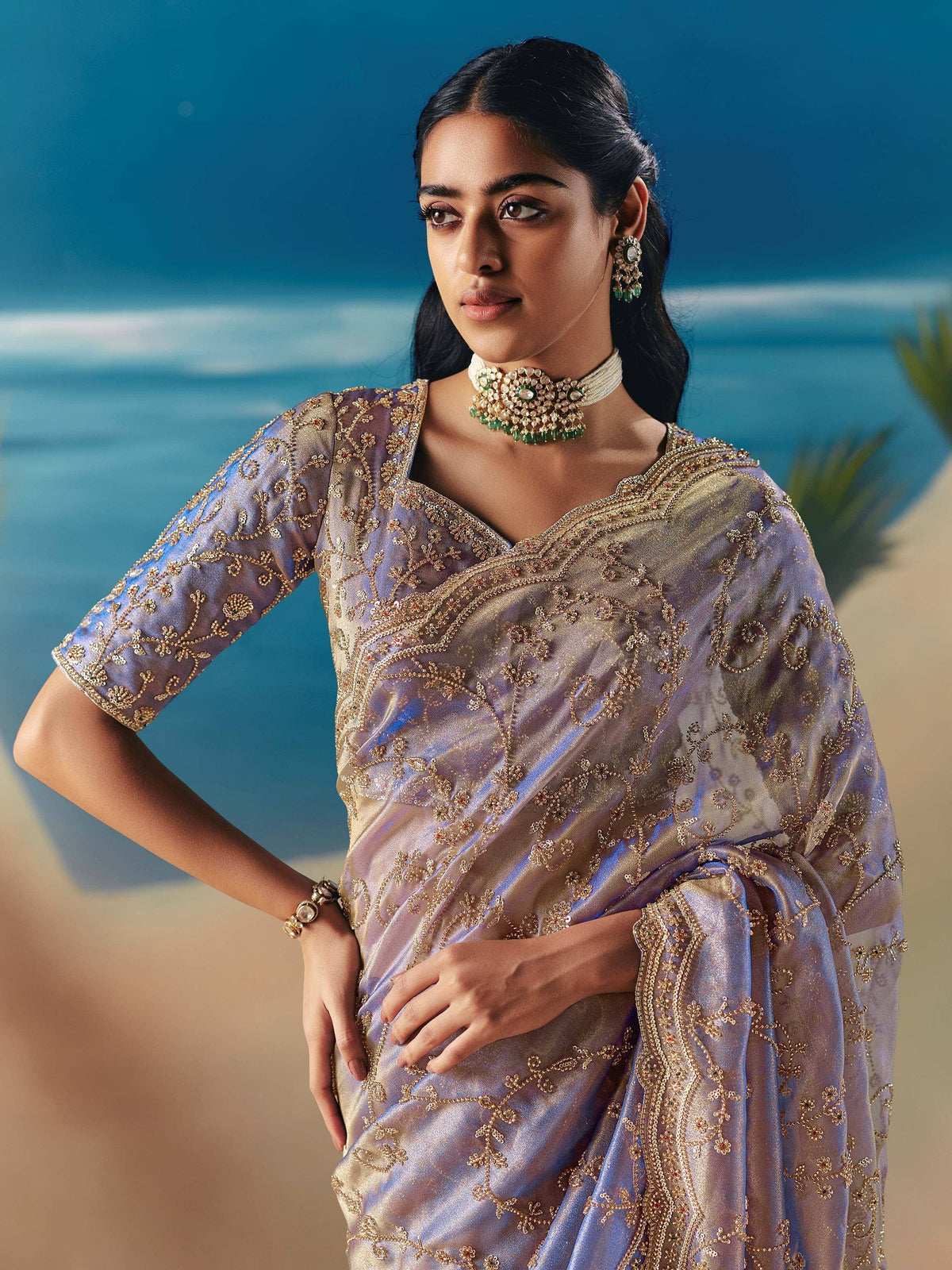 Elegant purple saree with gold embroidery, perfect for Indian ethnic wear and festive occasions.
