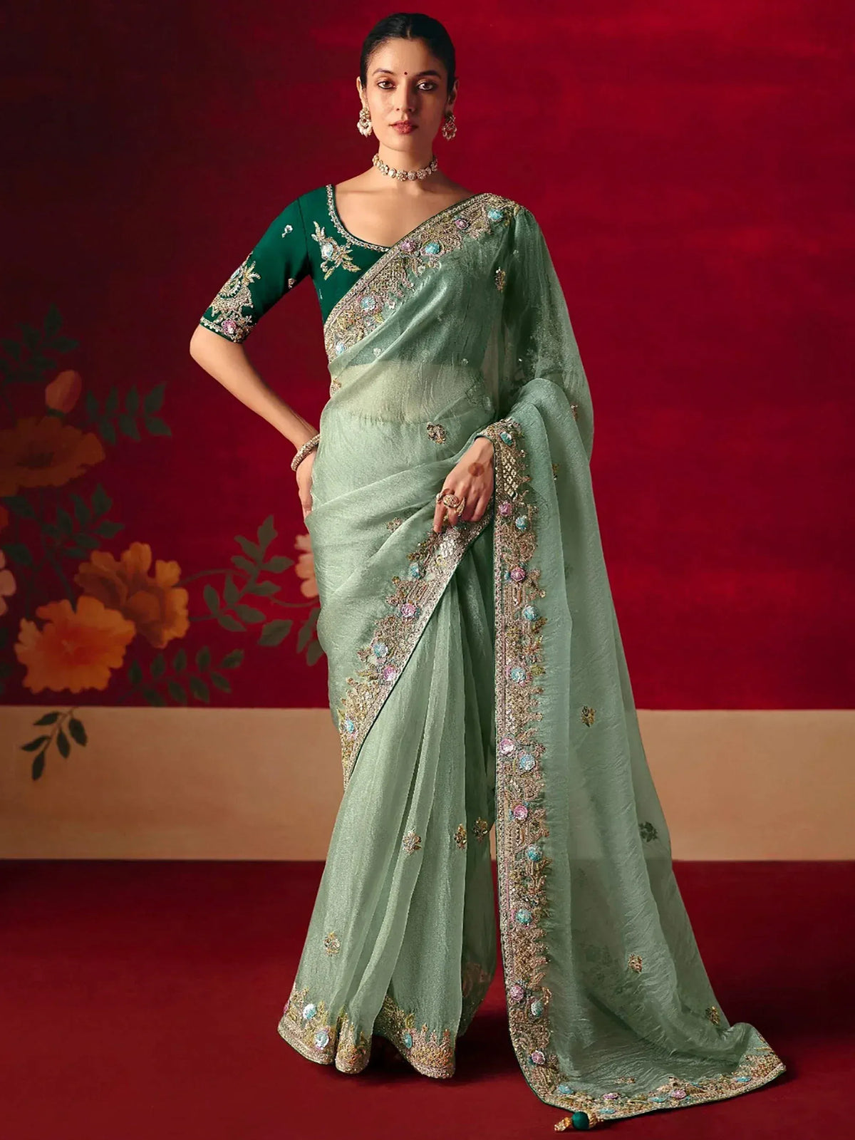 Mint green embroidered saree with green blouse, perfect for Indian ethnic wear occasions