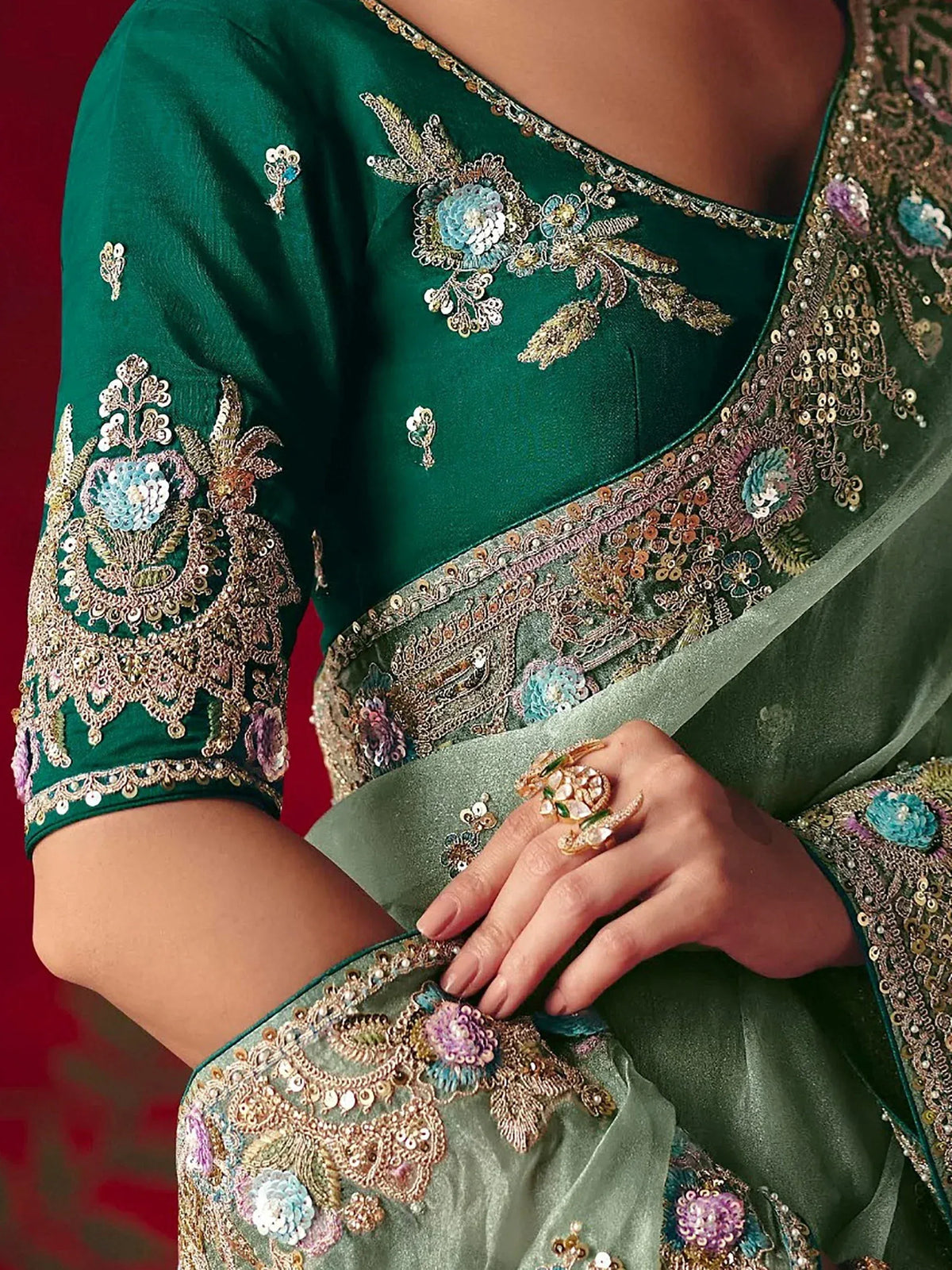 Emerald green designer lehenga choli with intricate floral embroidery and sequin work, perfect for Indian ethnic wear.
