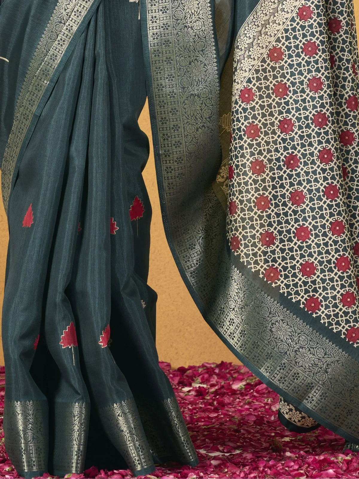 Dark blue designer saree with red floral embroidery and silver zari border, elegant ethnic wear