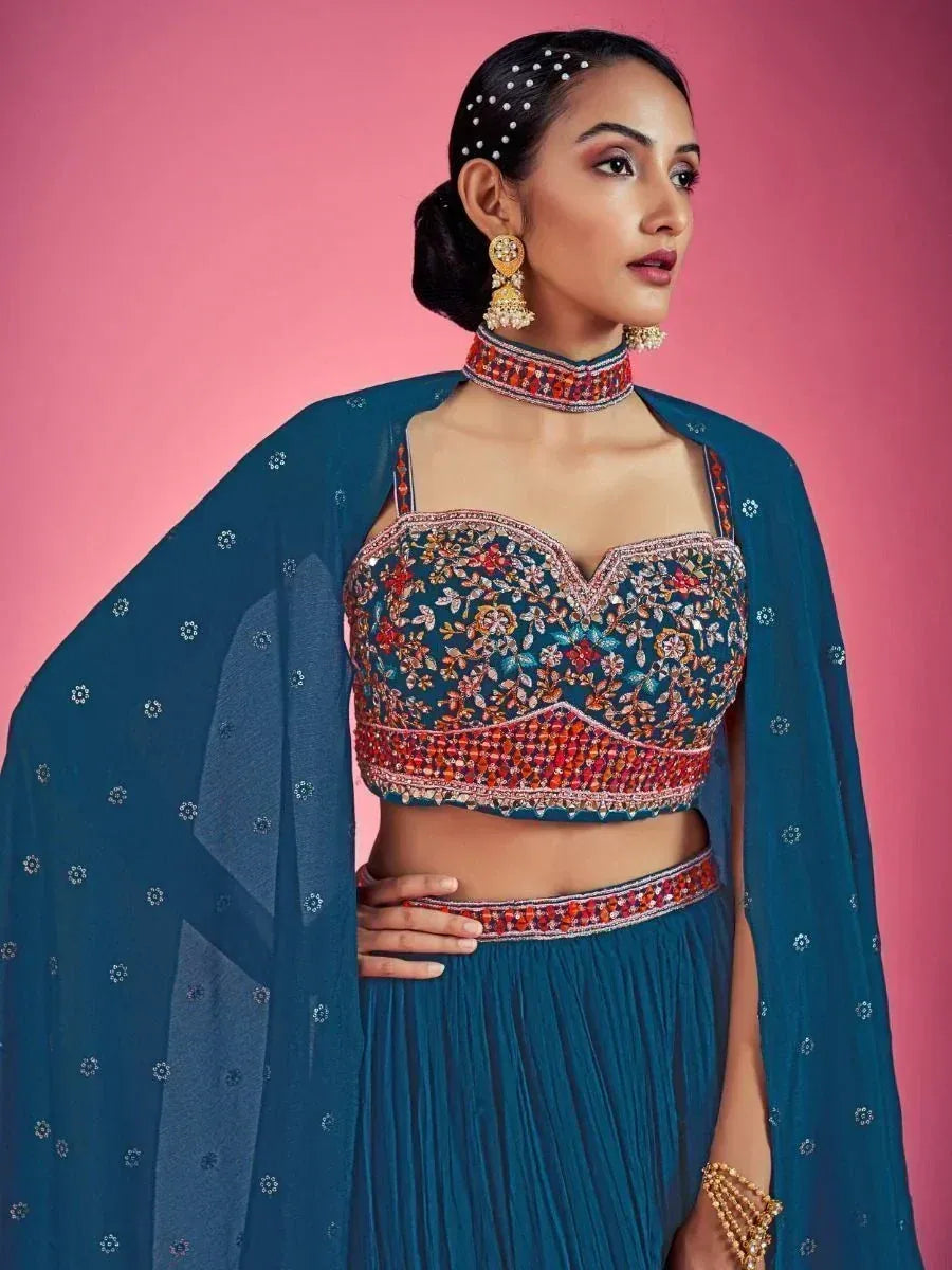 Yellow and pink embroidered lehenga choli with floral mirror work, perfect for Indian ethnic occasions