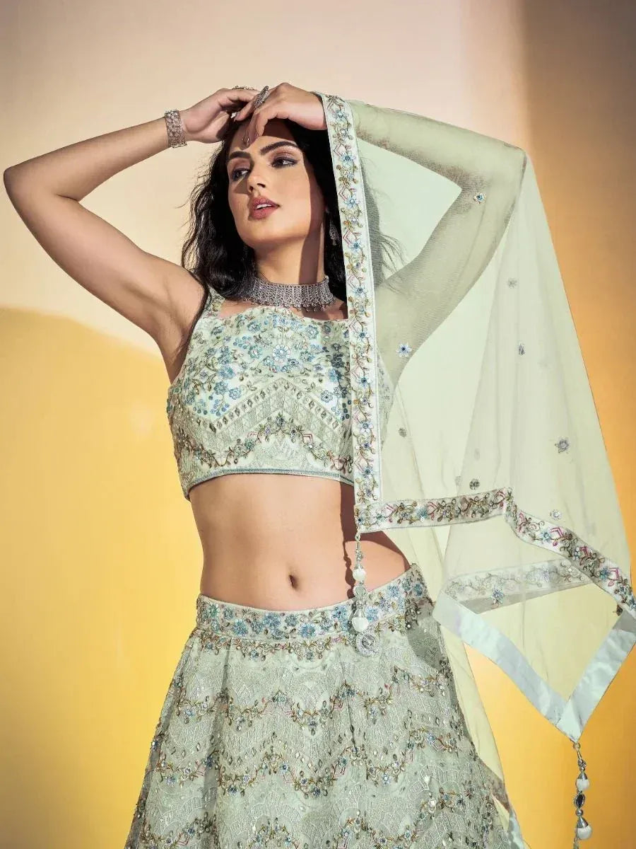 Mint green embroidered lehenga choli with matching dupatta, perfect for Indian ethnic wear occasions