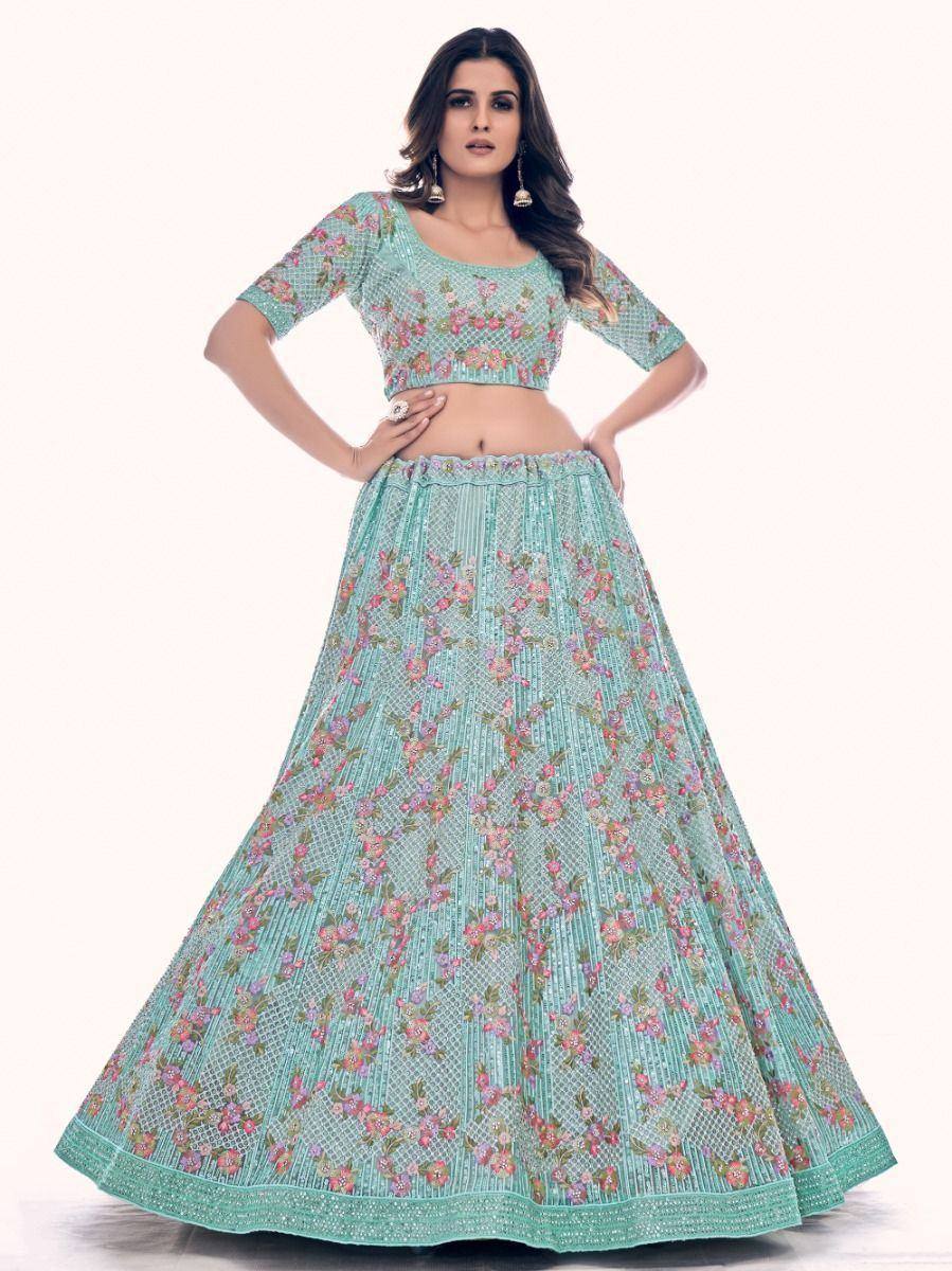 Mint green floral embroidered lehenga choli with net skirt, perfect for Indian ethnic occasions