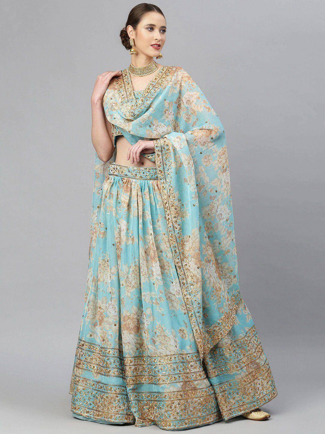 Turquoise floral lehenga choli with gold embroidery, perfect for Indian ethnic wear occasions