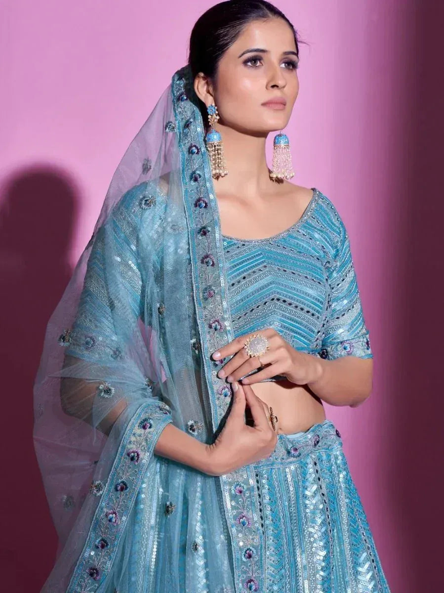 Blue embroidered lehenga choli with sheer dupatta, perfect for Indian ethnic wear occasions