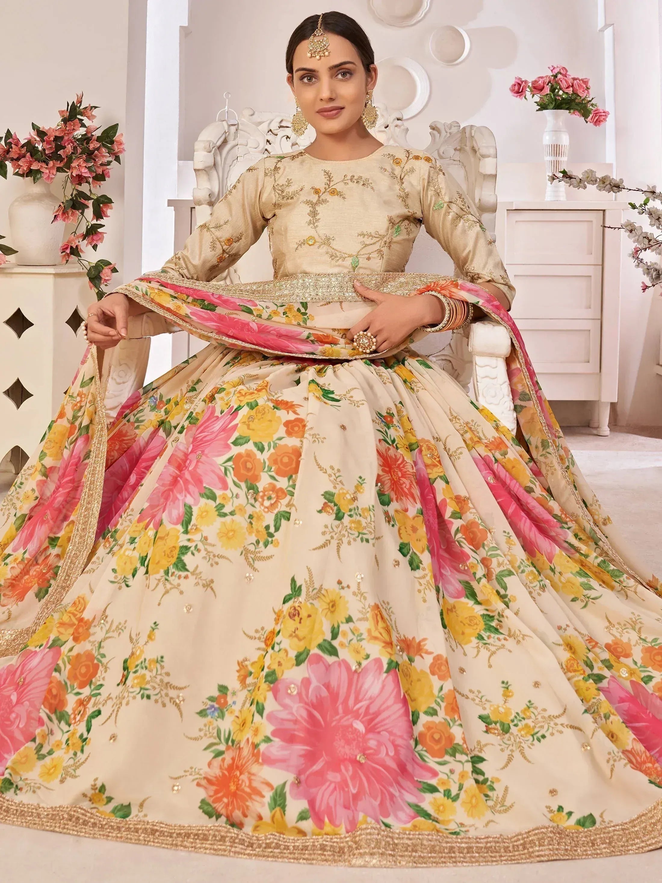 Floral print designer lehenga choli with gold embroidery, perfect for Indian weddings and festive occasions.