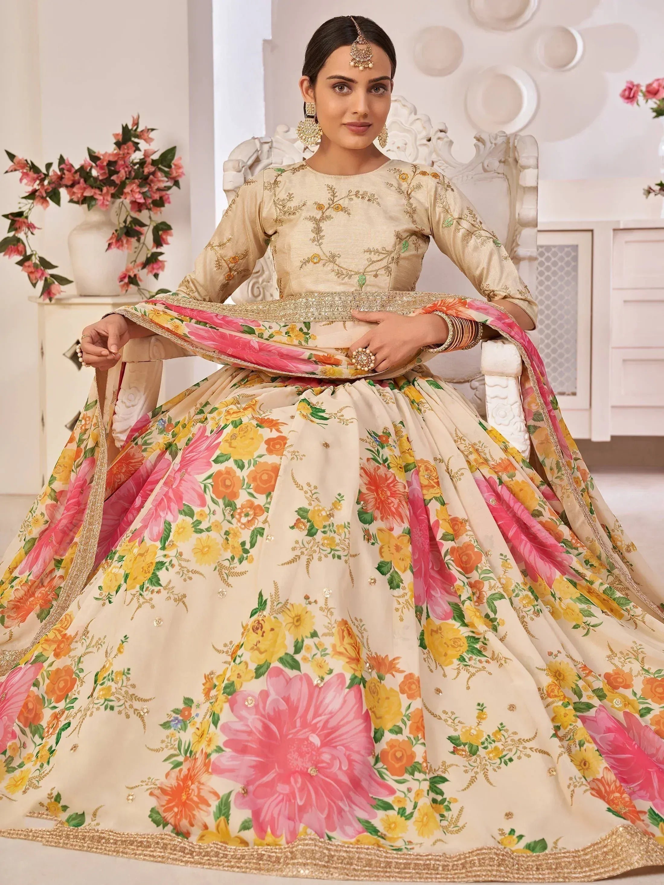 Floral print designer lehenga choli with gold embroidery, perfect for Indian weddings and festive occasions.