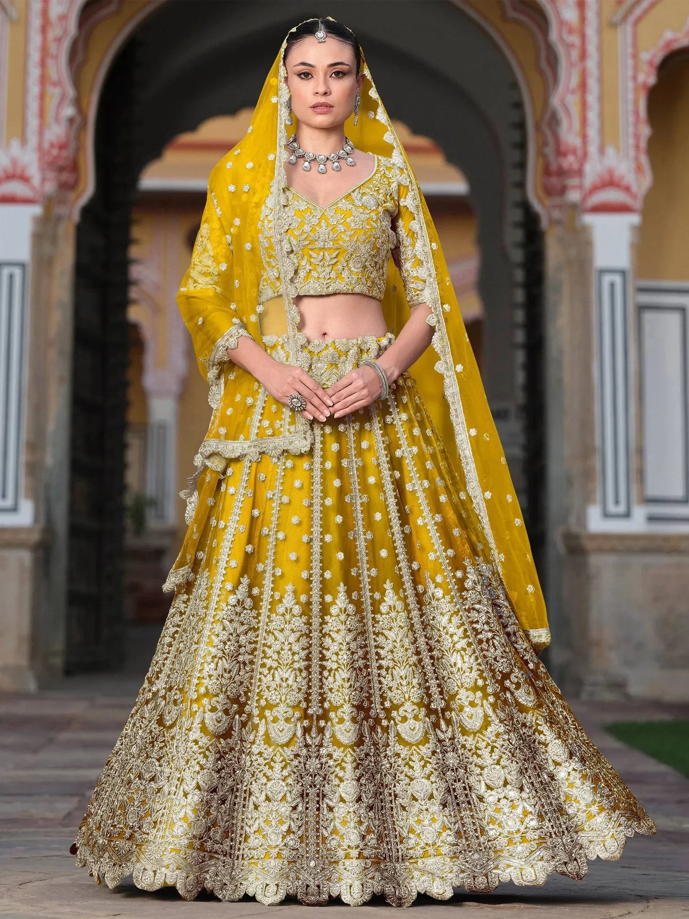 Yellow embroidered lehenga choli with dupatta, Indian ethnic wear for weddings and festivals