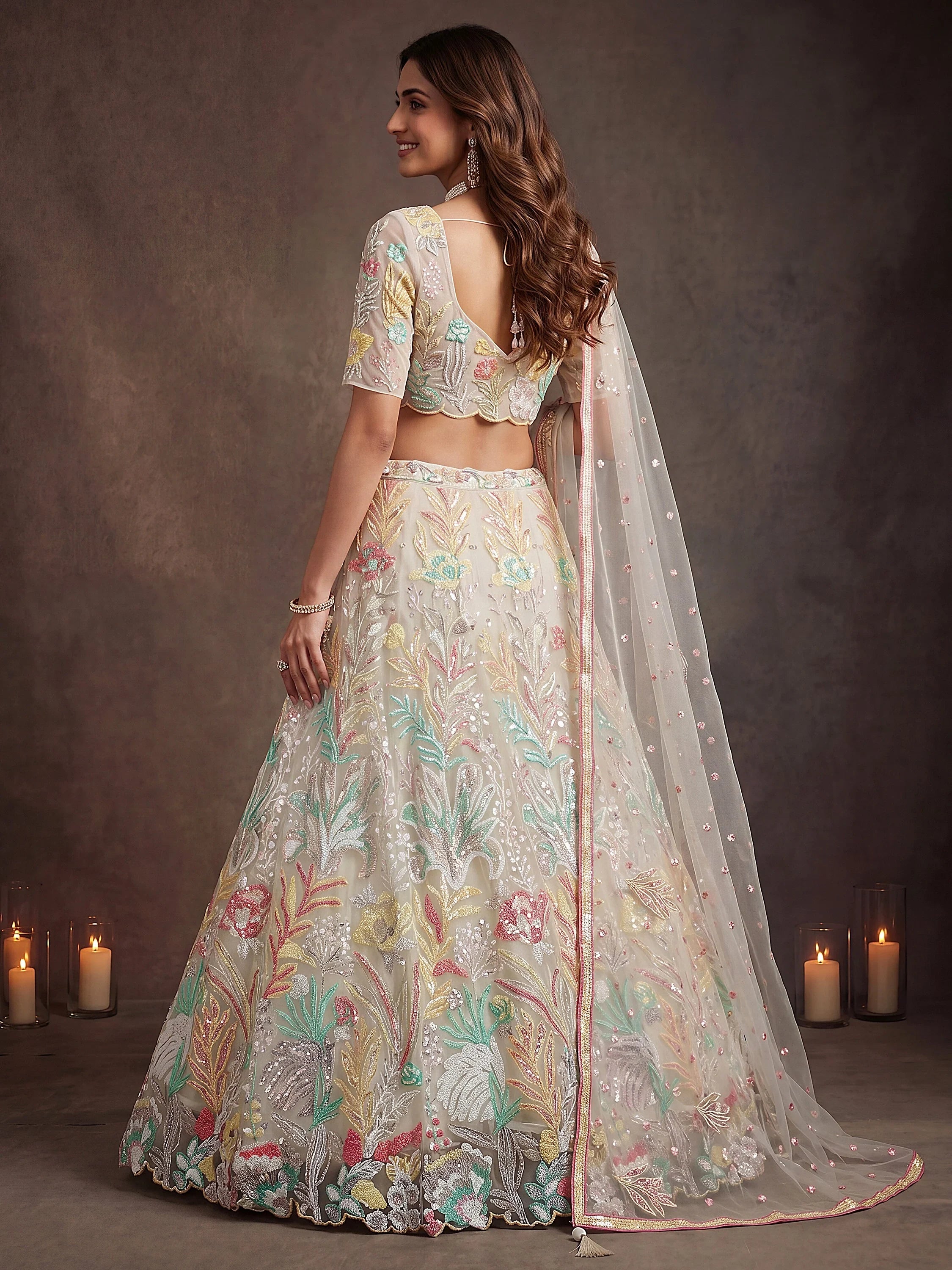Majestic Off-White Sequins Net Party Wear Lehenga Choli