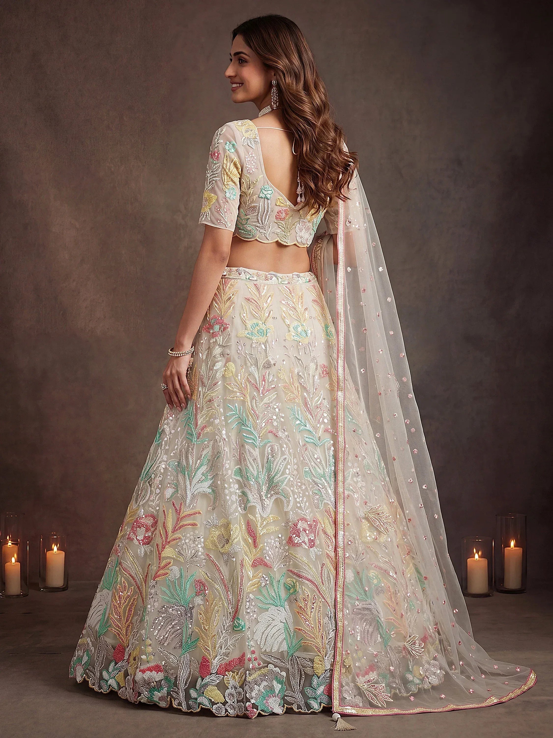 Majestic Off-White Sequins Net Party Wear Lehenga Choli