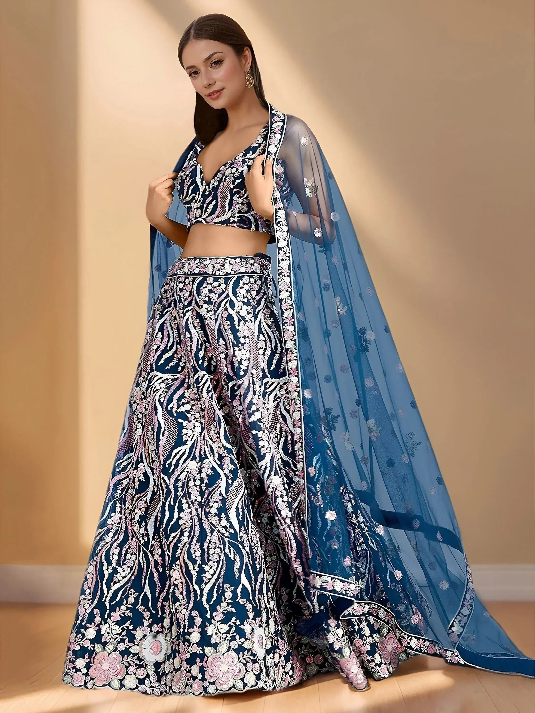 Elegant navy blue lehenga choli with floral embroidery and sheer dupatta for Indian ethnic wear