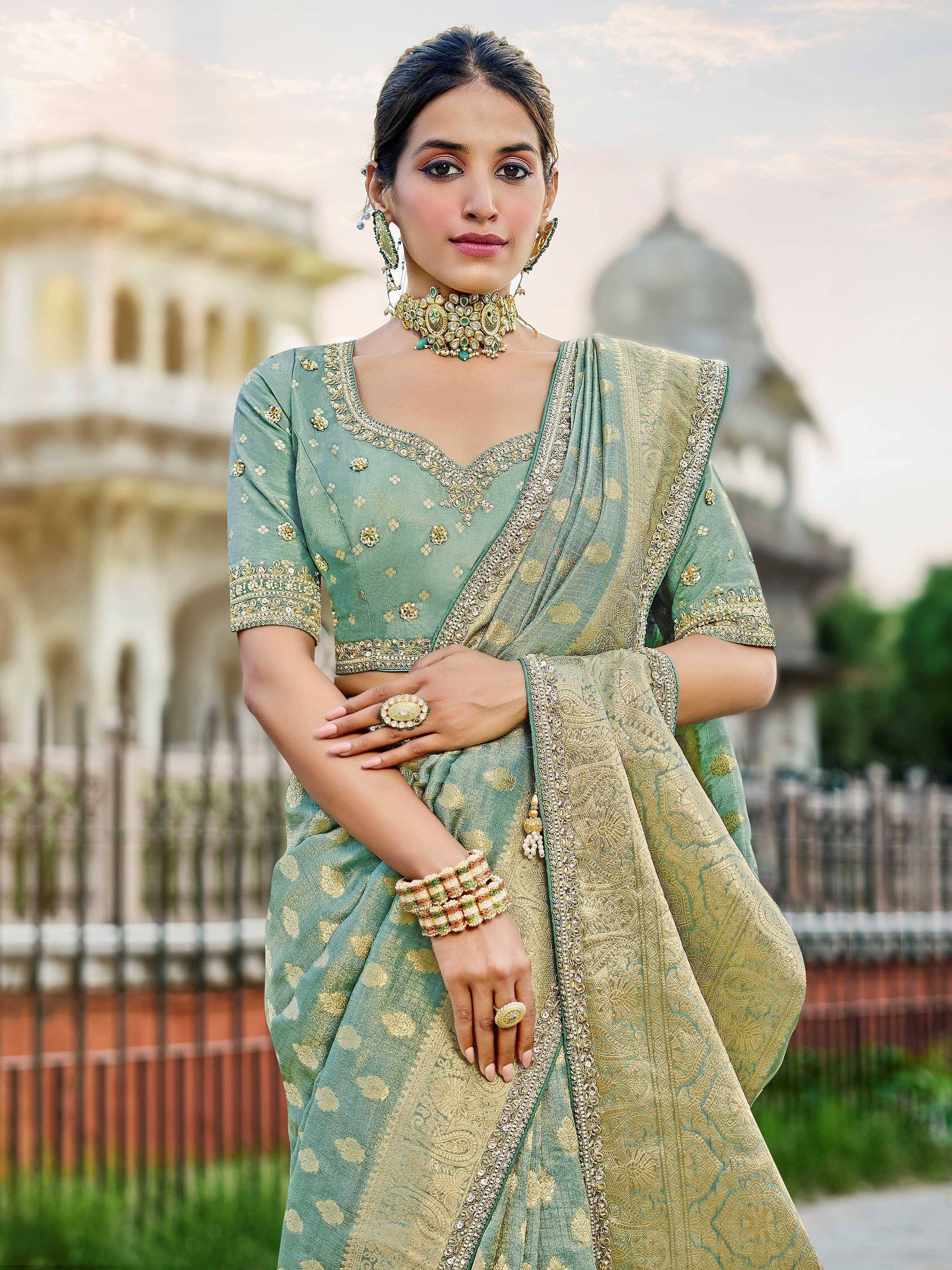 Alluring Green Zari Weaving Tissue Festive Wear Saree With Blouse