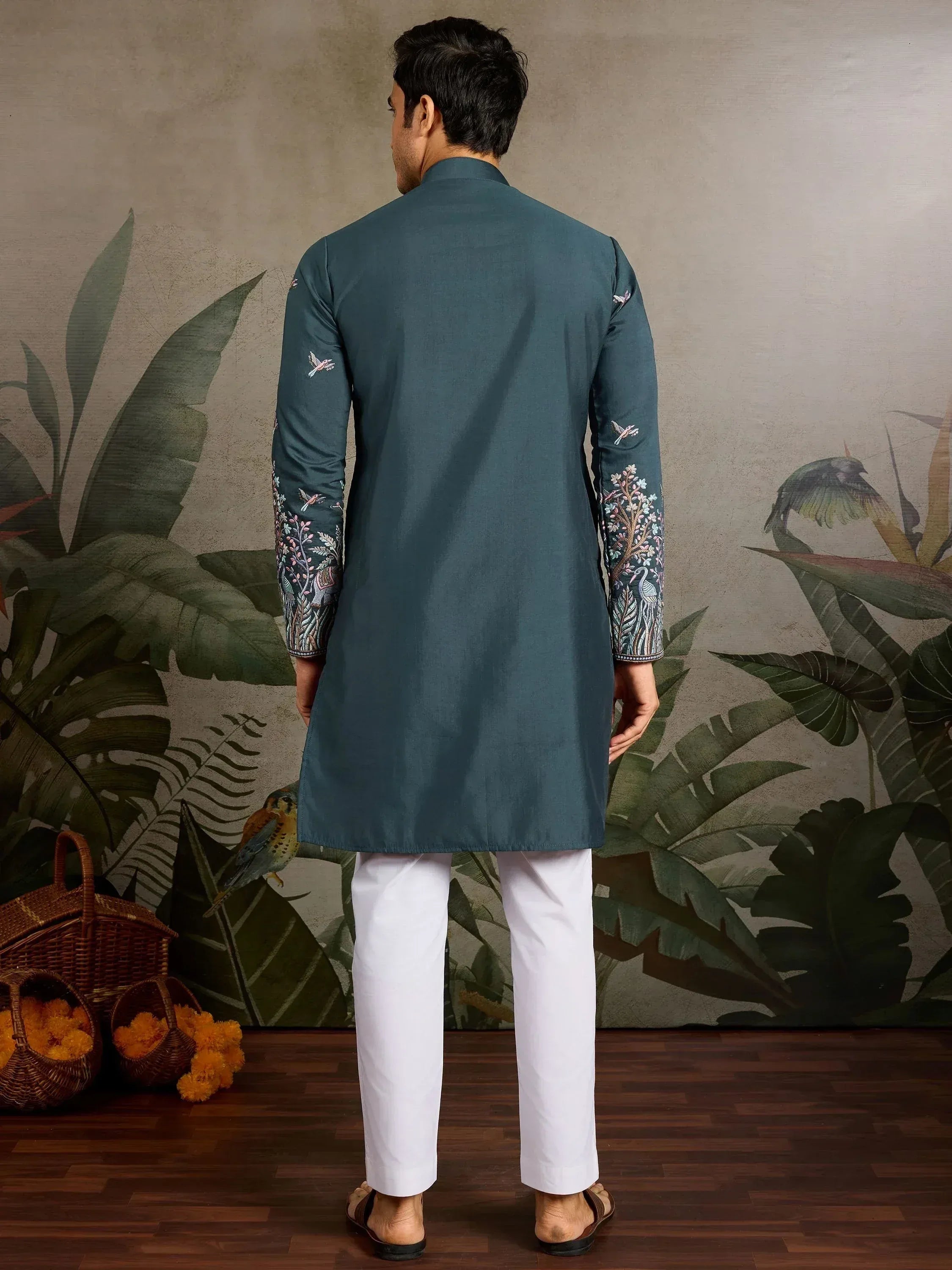 Teal embroidered kurta with floral bird motifs, paired with white pants, ideal for Indian ethnic occasions