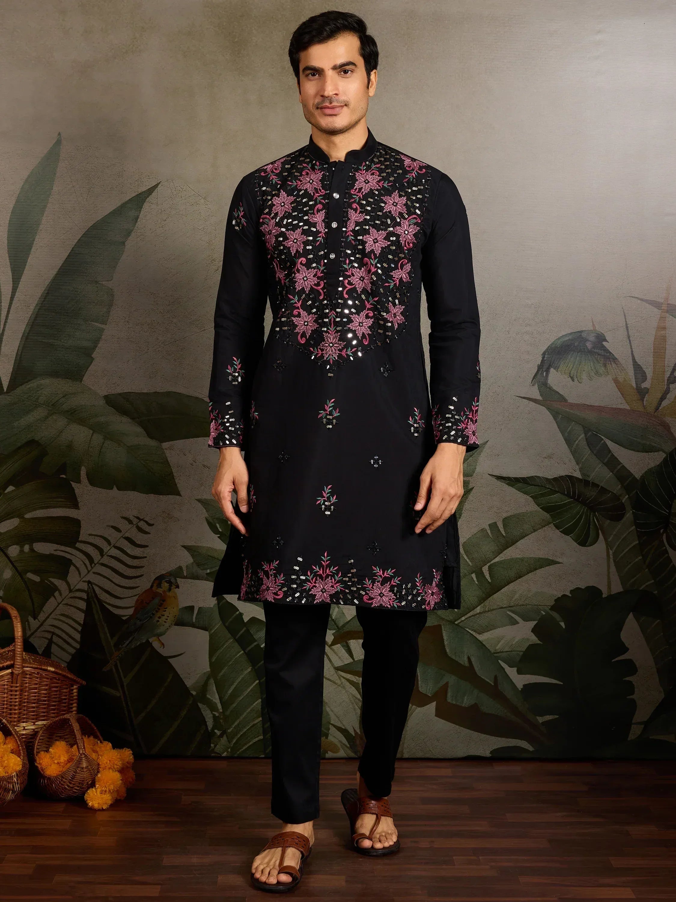 Black kurta with pink floral embroidery and sequins, paired with black pants for men's ethnic wear