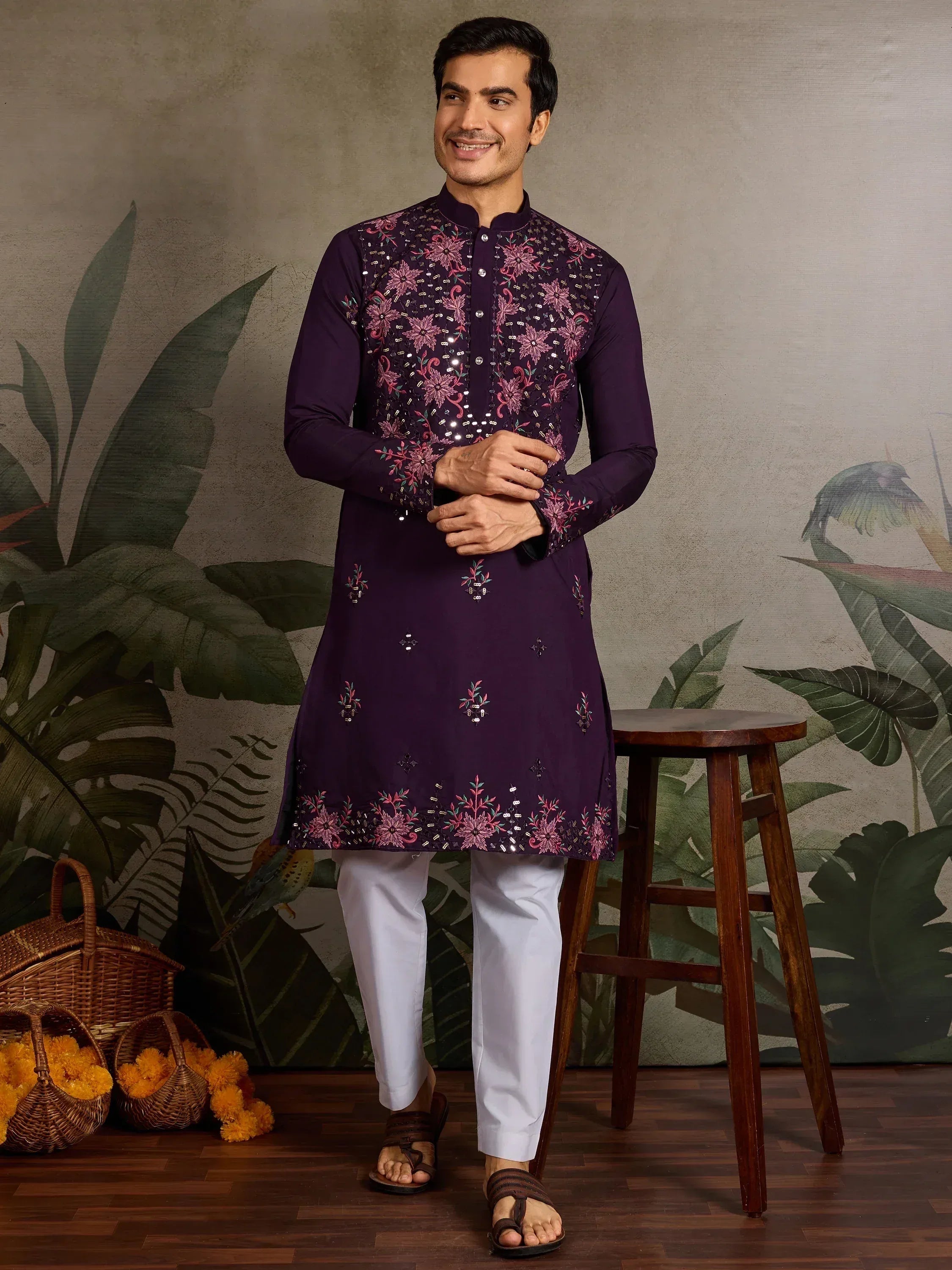 Purple embroidered kurta with floral sequin work, paired with white pants for Indian ethnic wear