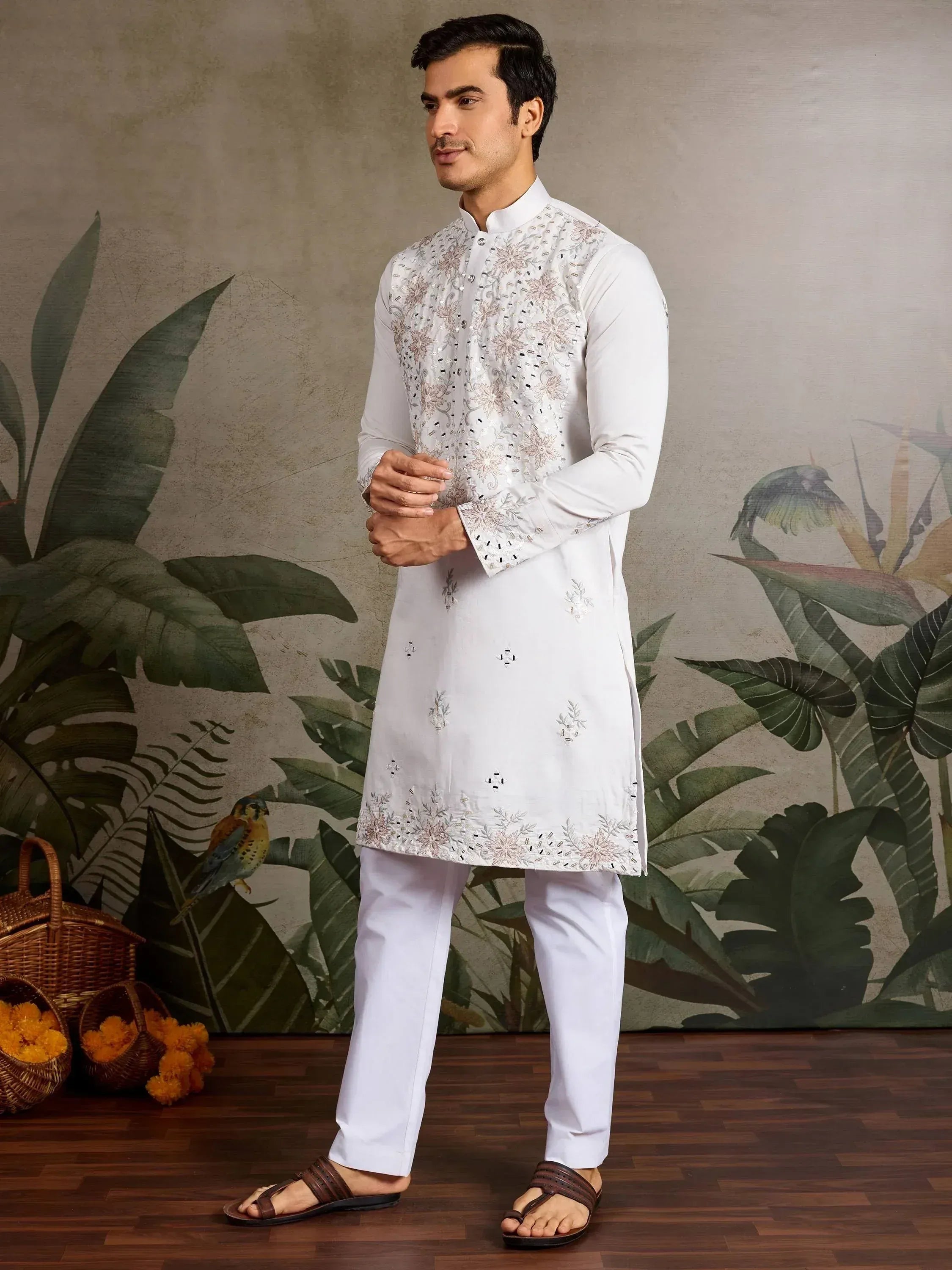 White embroidered kurta set with floral detailing, perfect for Indian ethnic occasions