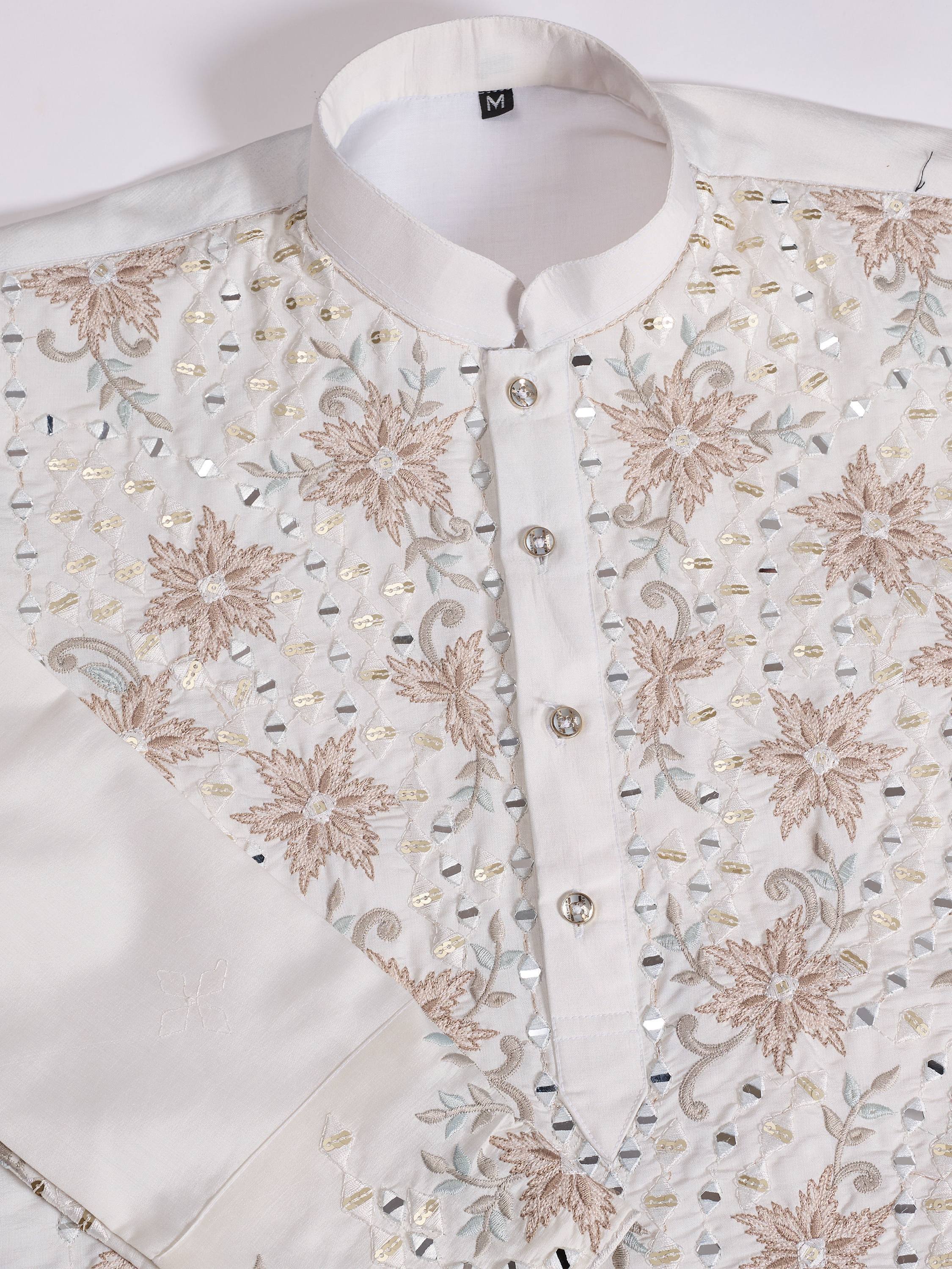 White ethnic kurta with floral embroidery and mirror work, perfect for Indian festive occasions