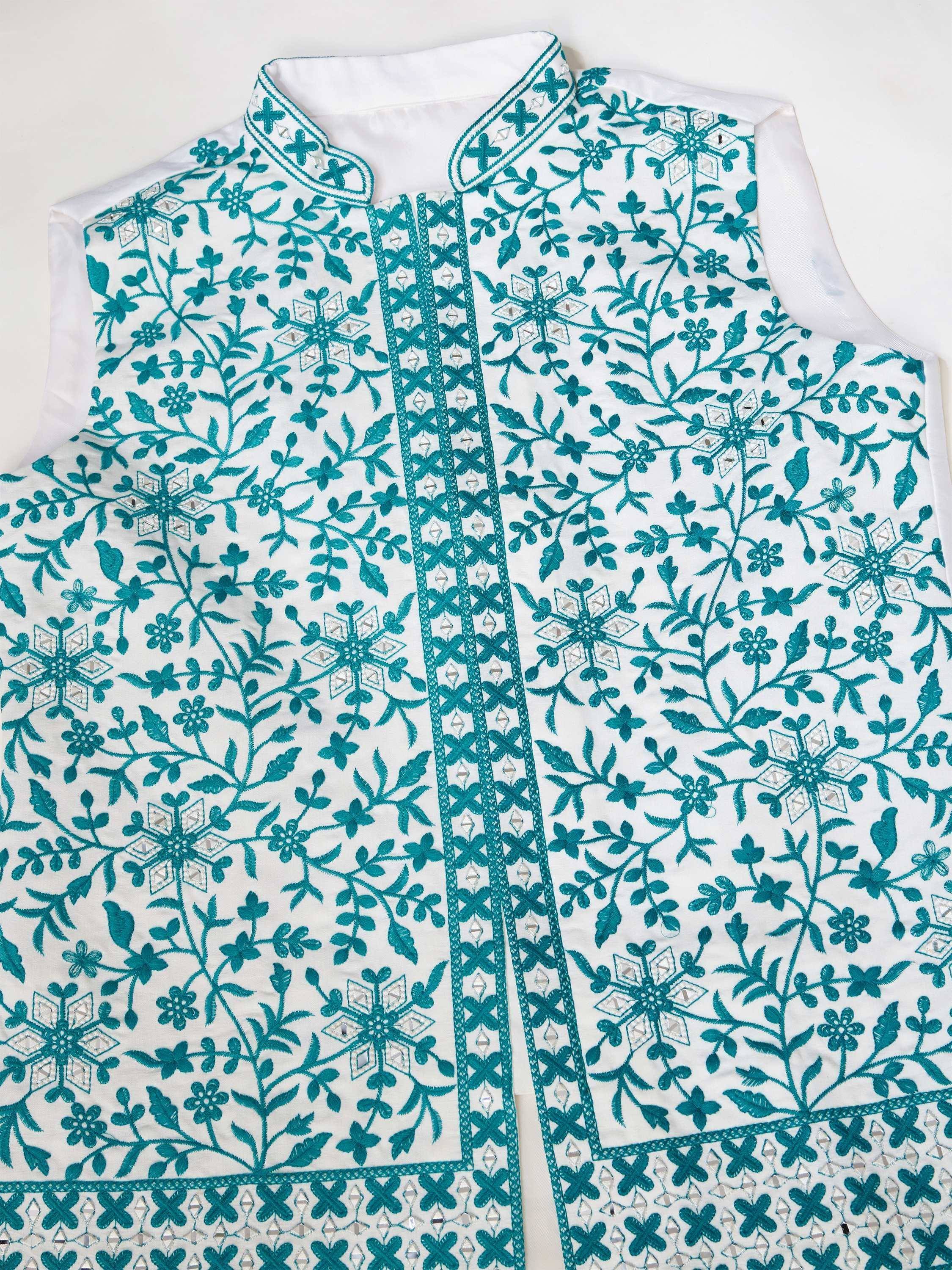 White ethnic jacket with teal floral embroidery and mirror work, perfect for Indian wear