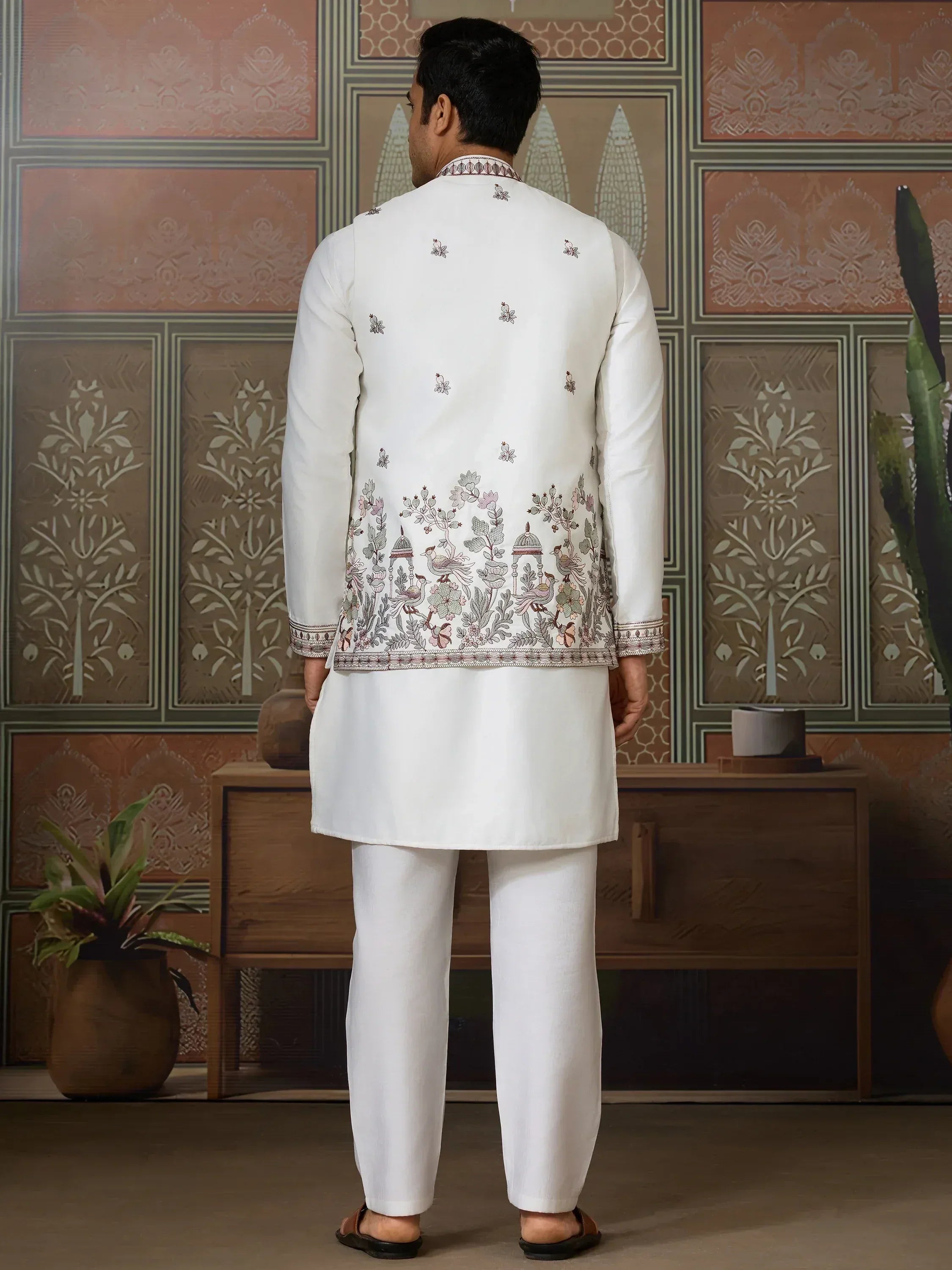 White embroidered kurta set with floral and bird motifs, traditional Indian ethnic wear for men