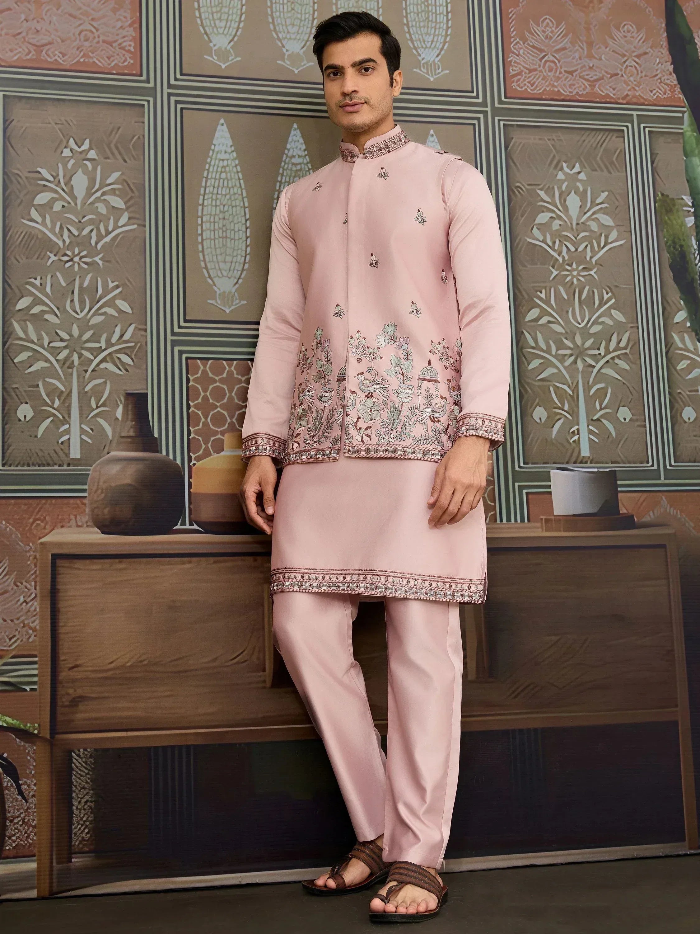 Pink embroidered kurta set with floral motifs, perfect for Indian ethnic wear occasions