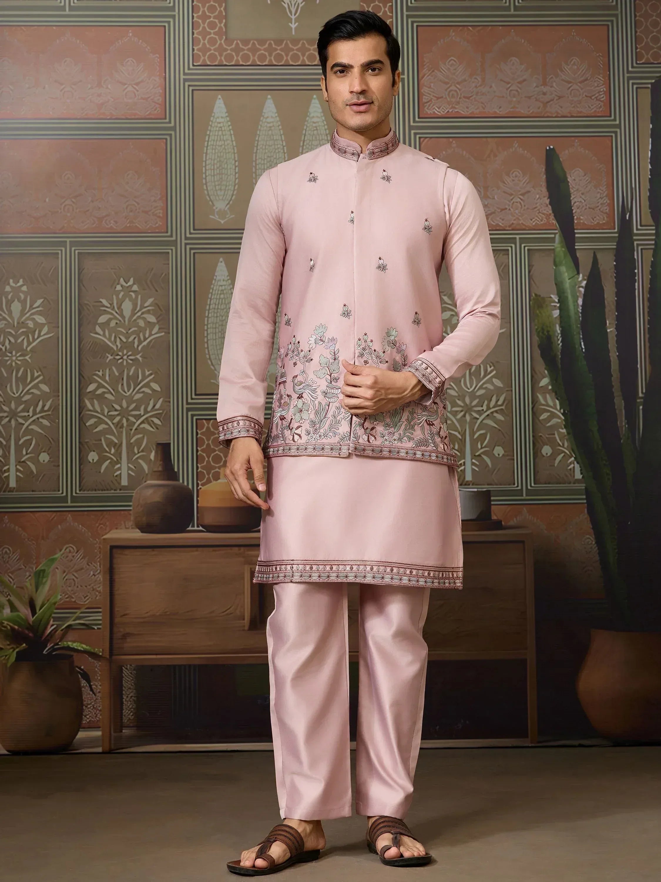 Pink embroidered kurta set with floral motifs, perfect for Indian ethnic occasions